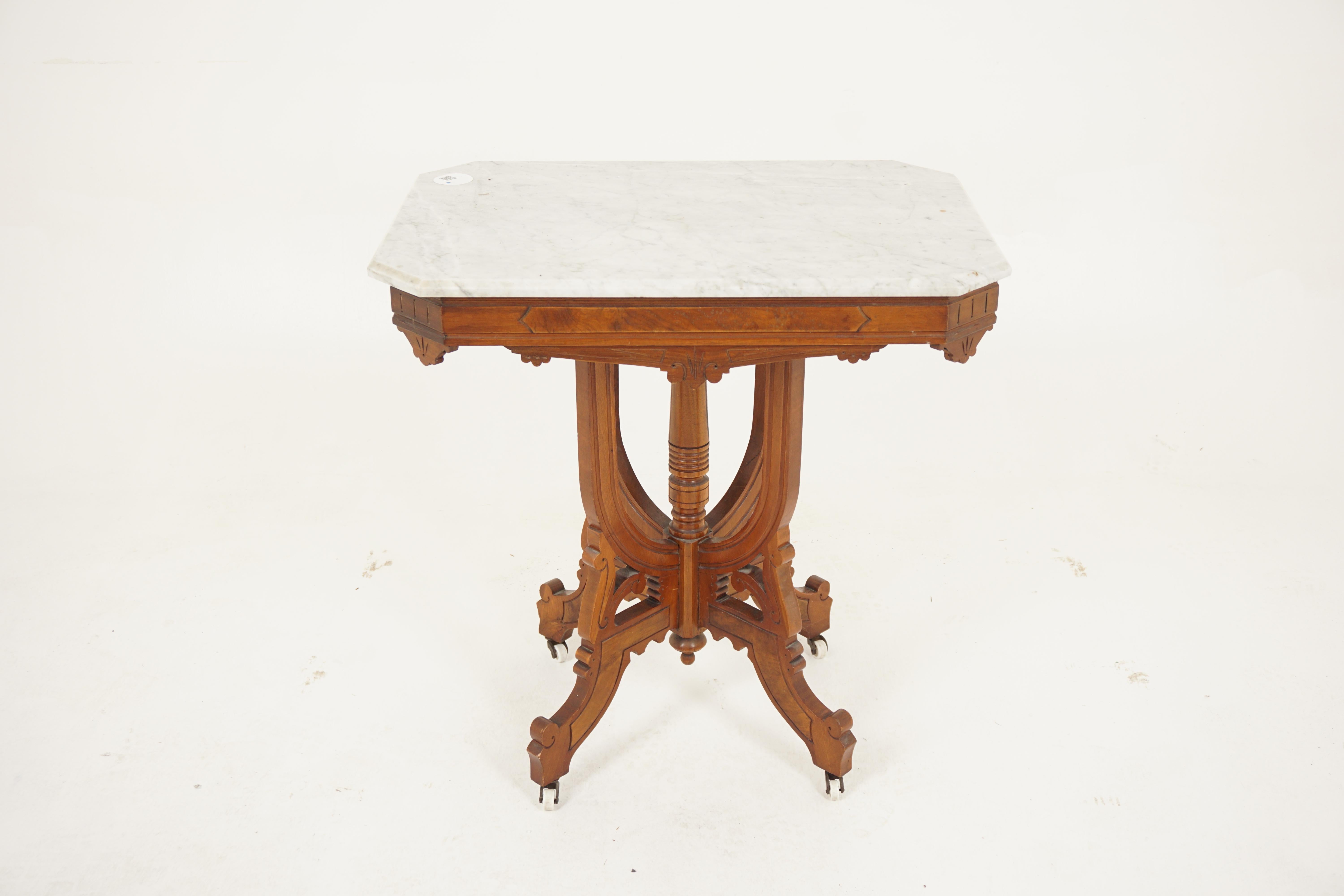 Antique Walnut Marble Top East Lake Hall, parlour table, American 1880, H907

American 1880
Solid Walnut 
Original Finish 
White marble top with canted corners 
Sitting on a carved walnut base 
With shape skirt 
For shaped supports with a