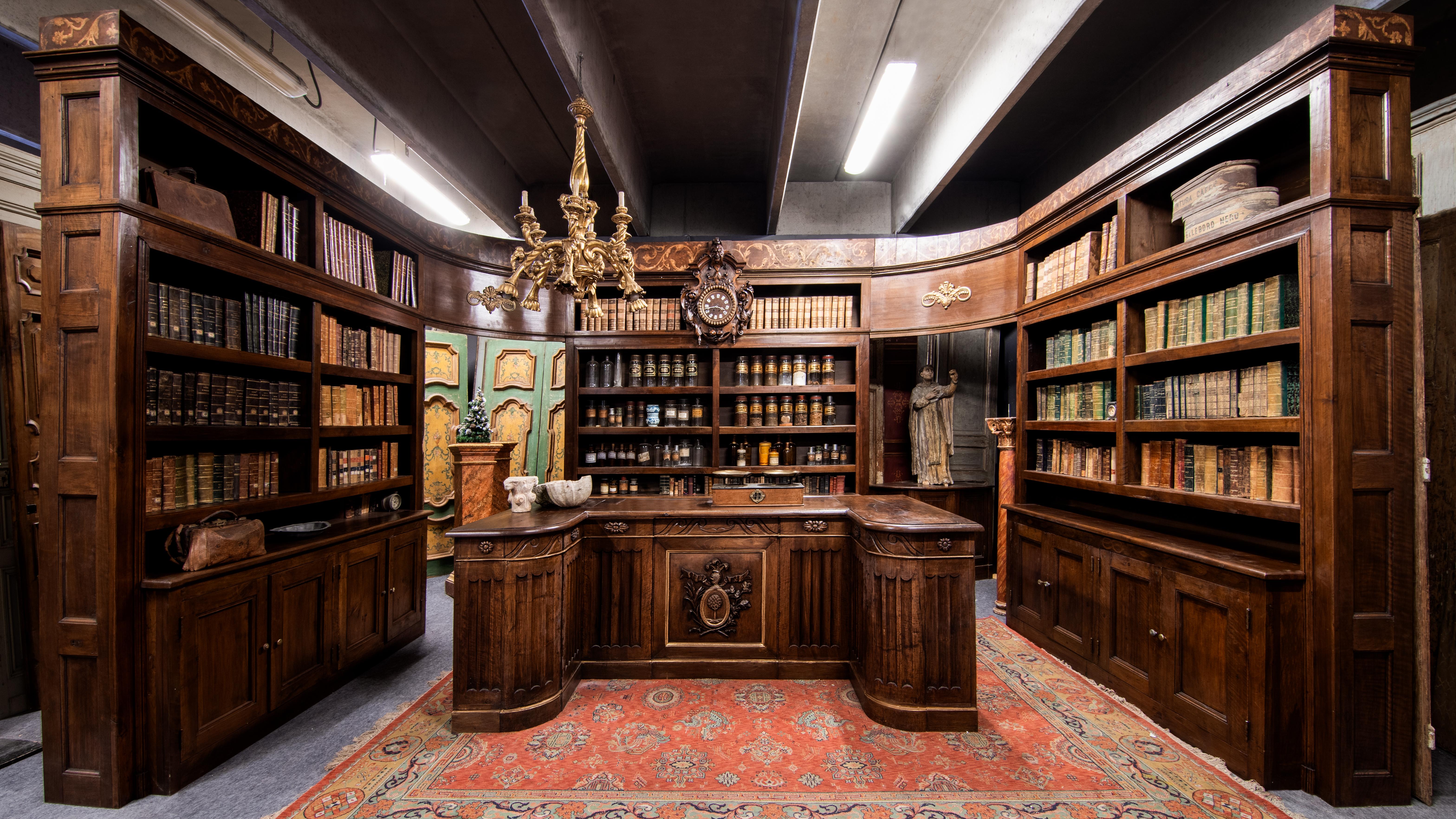 Complete antique pharmacy cabinet, all hand built and carved in precious solid Italian walnut wood, complete with 3 