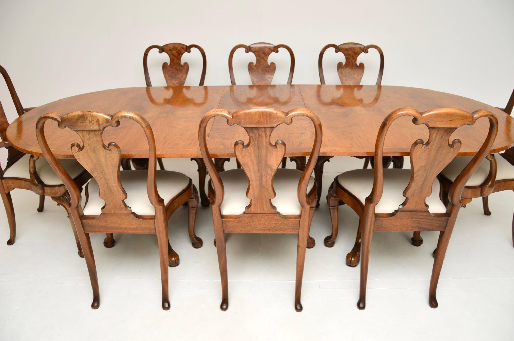 A magnificent antique walnut Queen Anne style dining table and eight chairs. This was made in England, it dates from the 1920’s.

The quality is absolutely superb, the chairs are beautifully constructed, they are very sturdy with crisp carving and