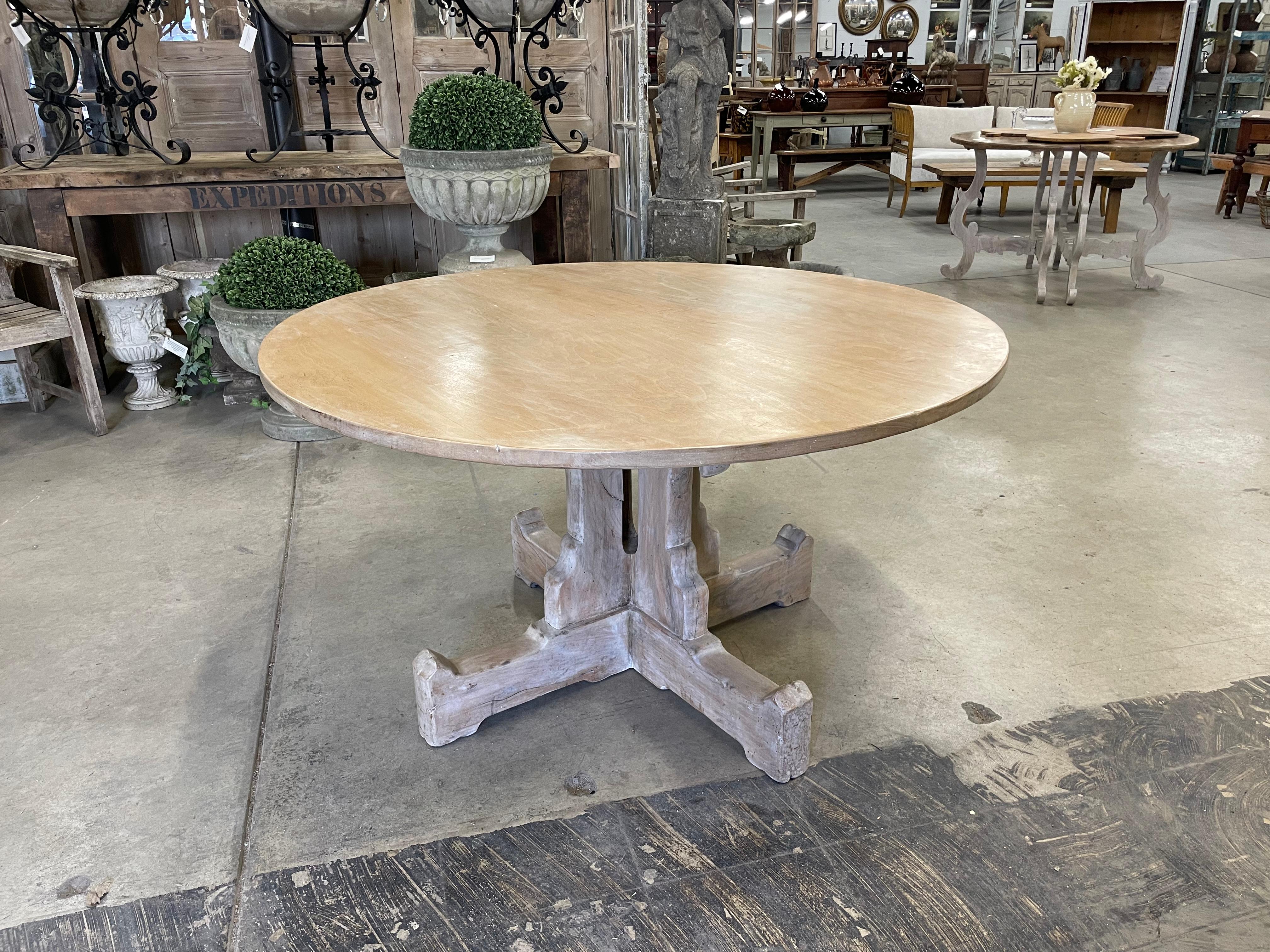 This substantial quality English antique solid walnut round breakfast table is on a carved four baluster base.

This beautiful English Arts &=Crafts table has a polished and a lime-wash finish pedestal base.

