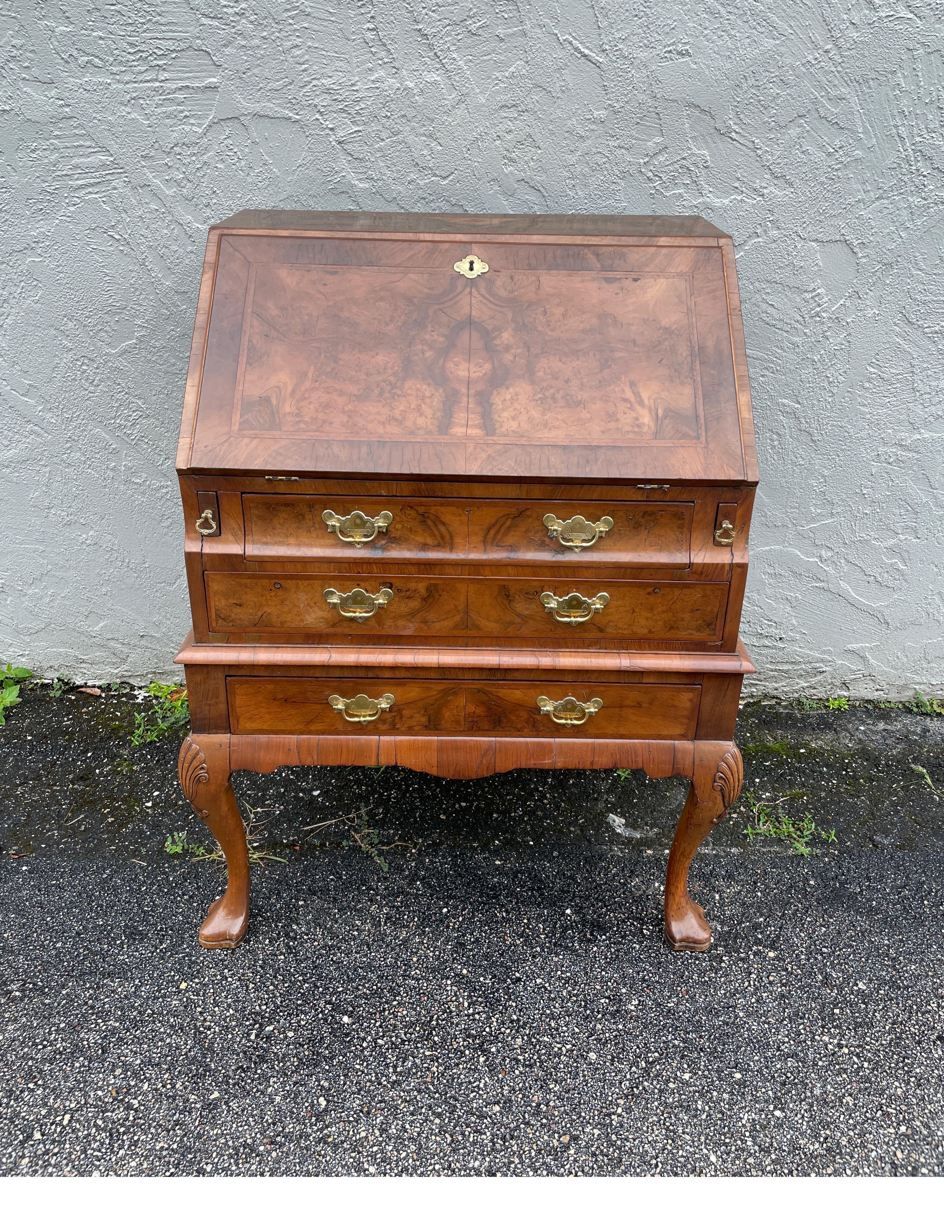 Late 19th century English Queen Anne style slant front desk with three drawers & inner compartments.