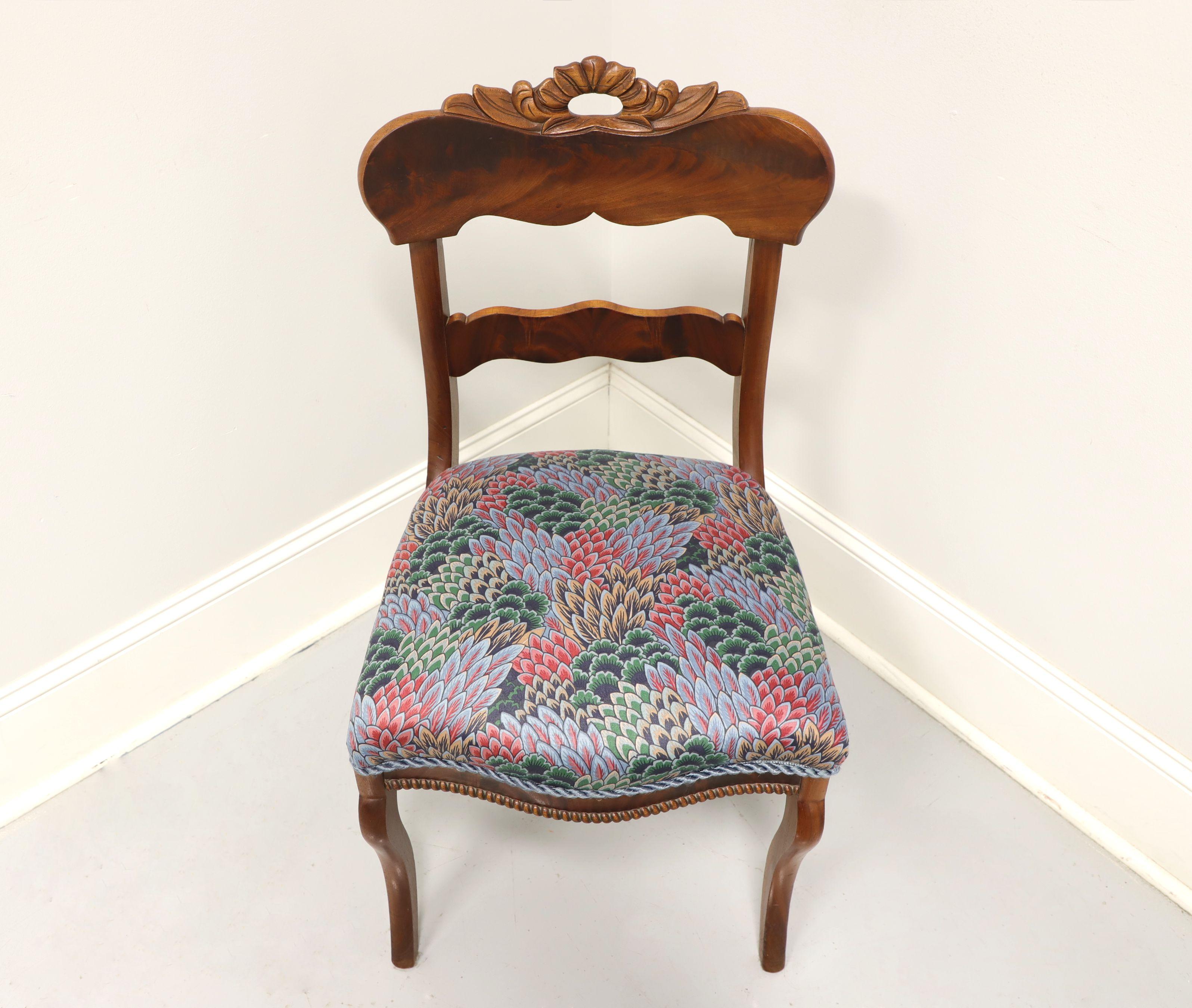 An antique Victorian style side chair, unbranded. Solid walnut with decoratively carved open crest rail, curved back rest, floral fabric upholstered seat, decorative beading to apron and curved legs. Like made in the USA, in the late 19th