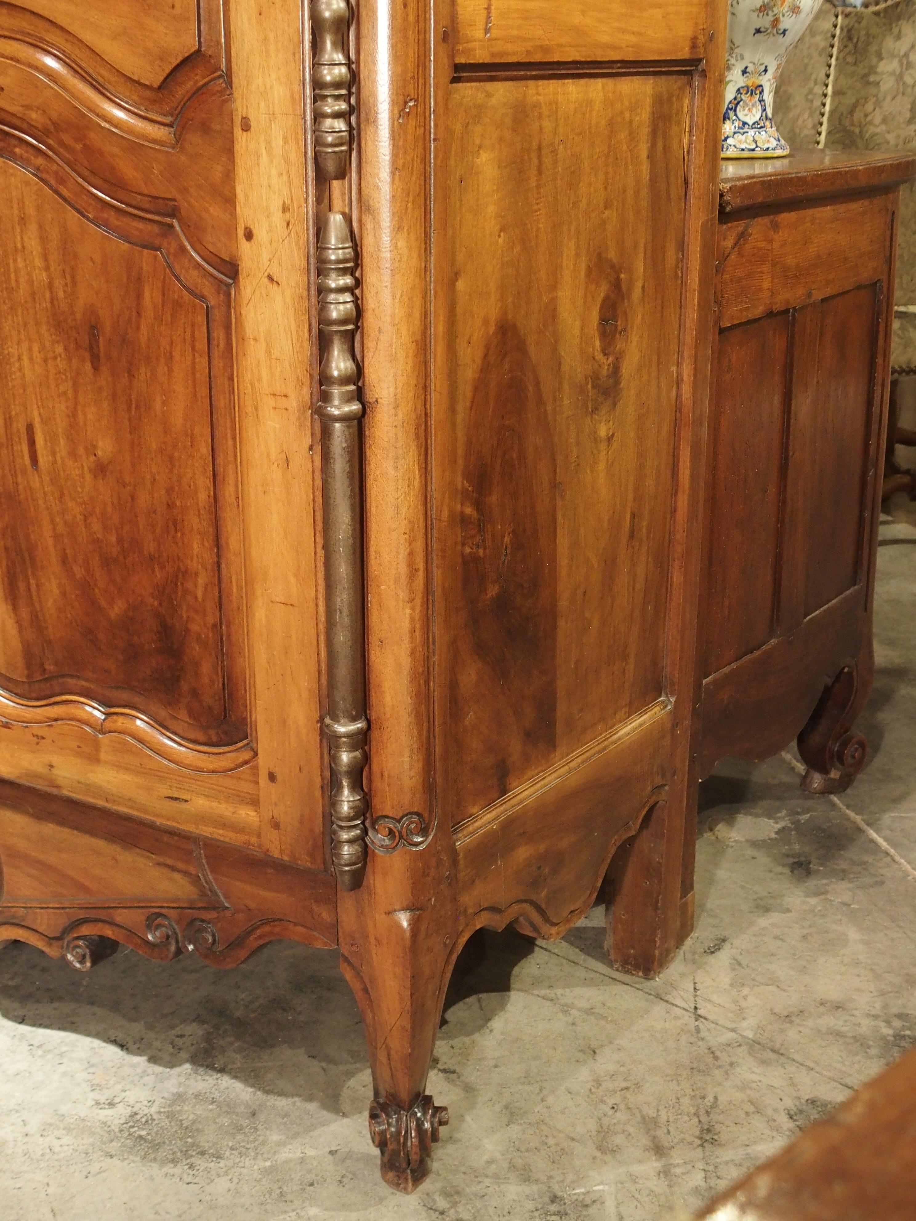 Carved Antique Walnut Wood Armoire from Fourques, France, Circa 1820 For Sale