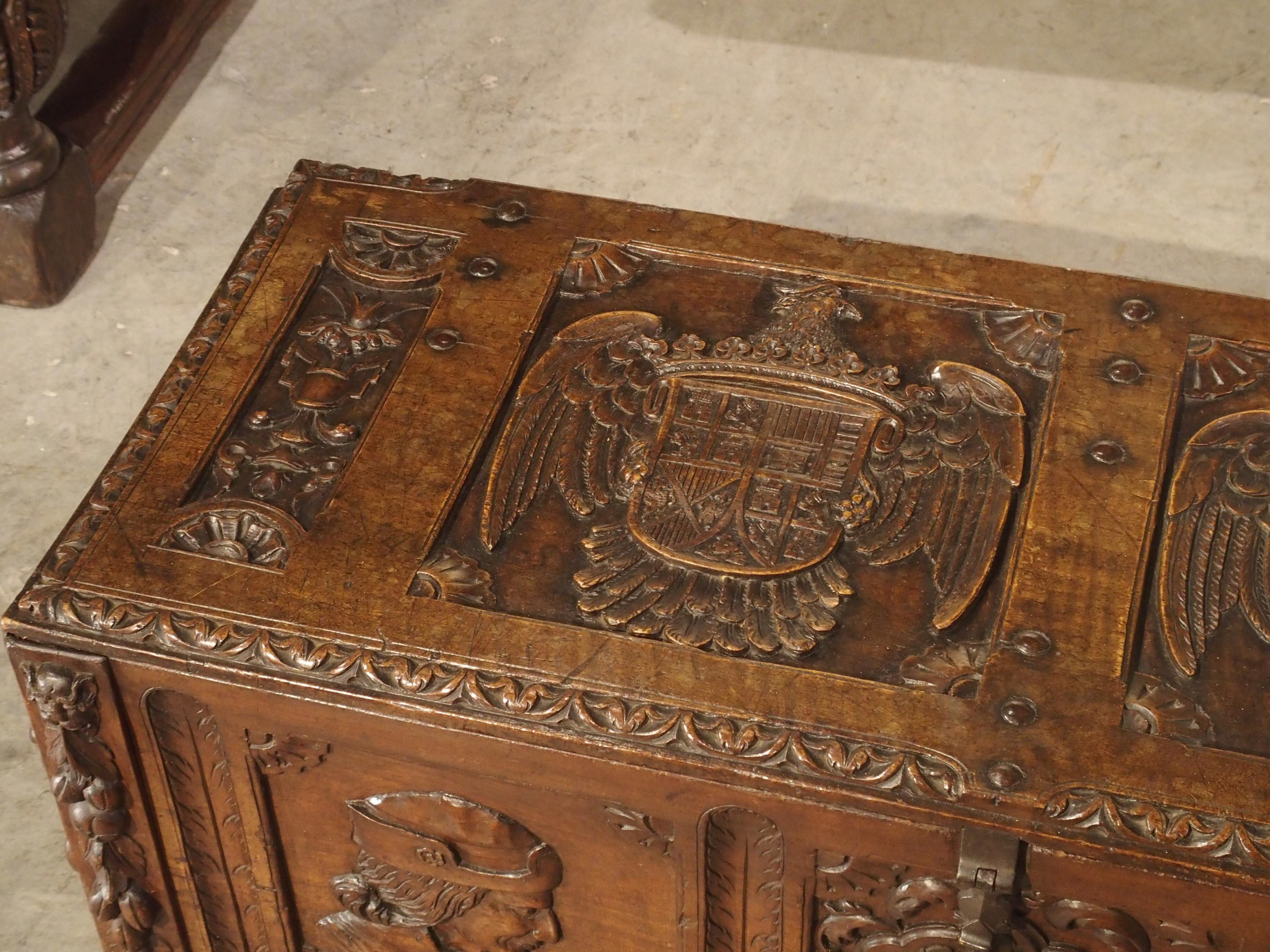 Spanish Antique Walnut Wood Renaissance Style Armorial Trunk from Spain
