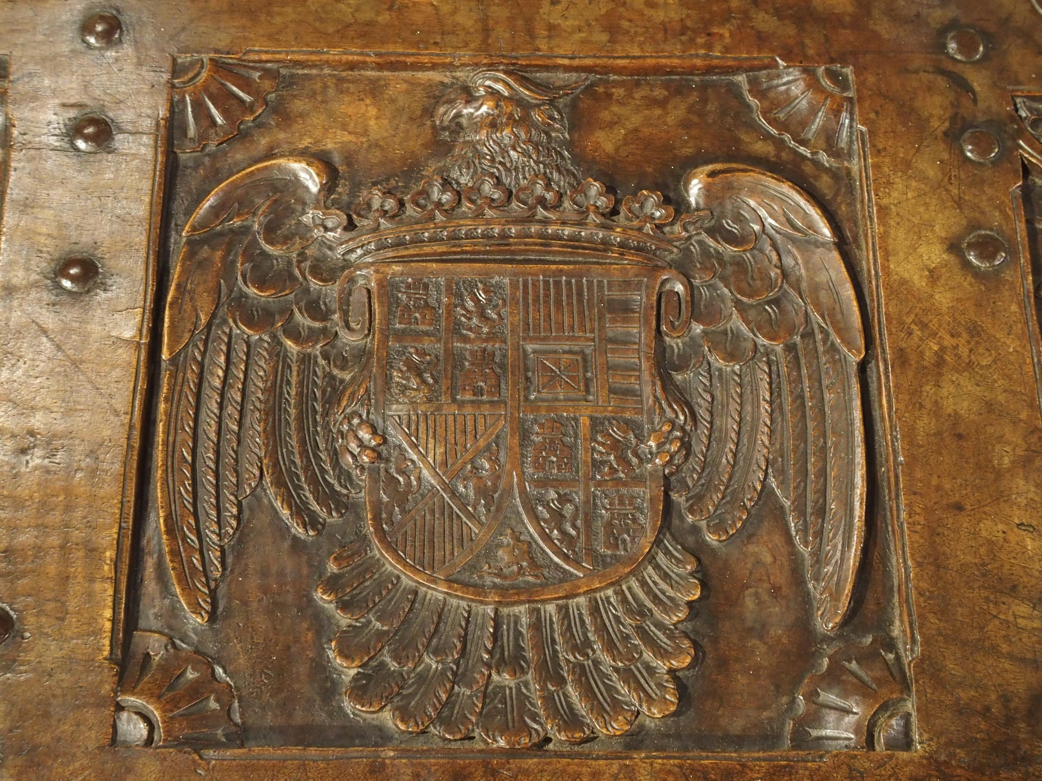 Hand-Carved Antique Walnut Wood Renaissance Style Armorial Trunk from Spain
