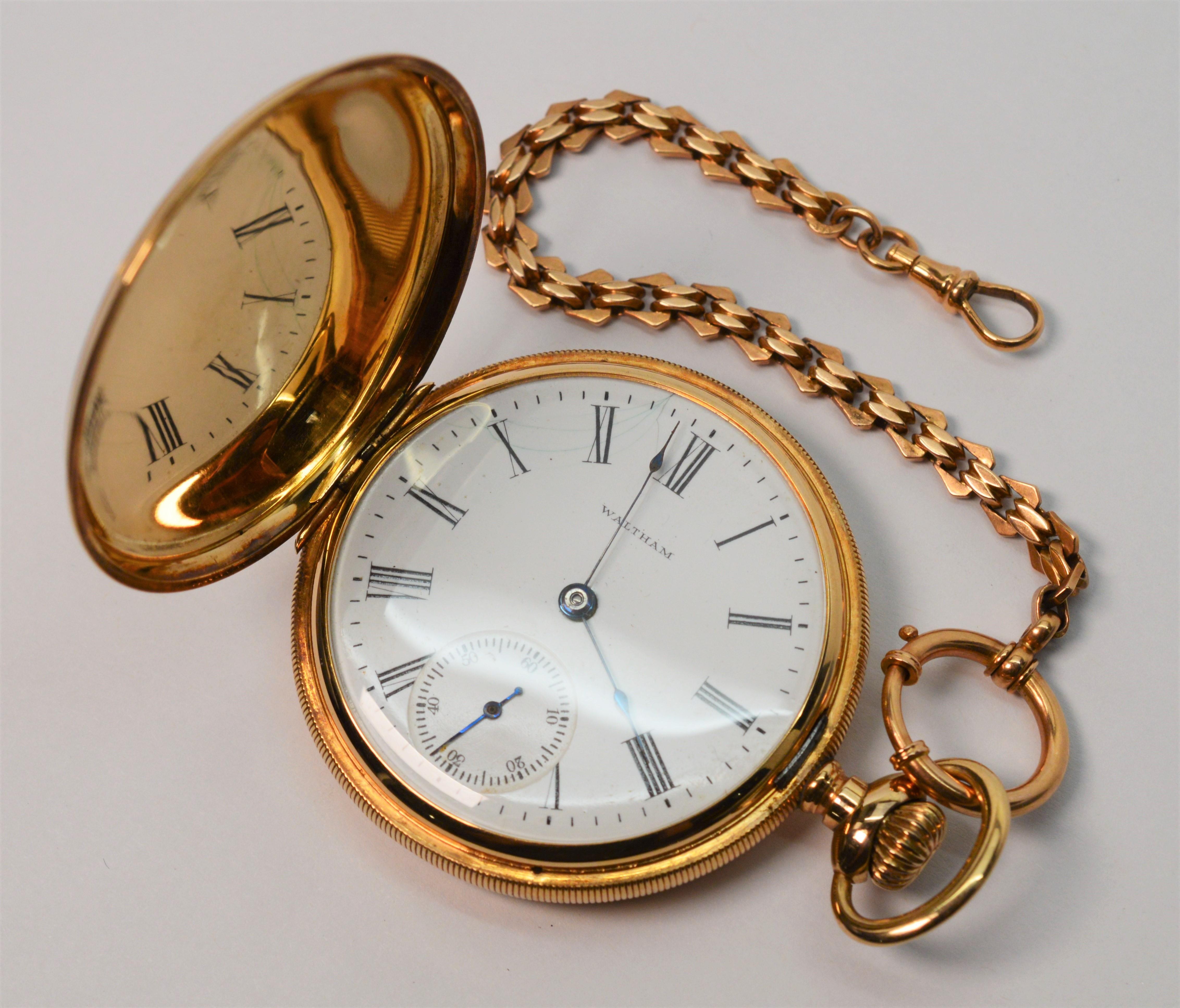 Enjoy this classic ,circa 1903, antique Waltham Pocket Watch #610, model 1899, size 16 s with 48mm hunting case #6250067 in 14 karat yellow gold. 
This early 20th century American made pocket watch is made with a fancy acid etched movement #12811871