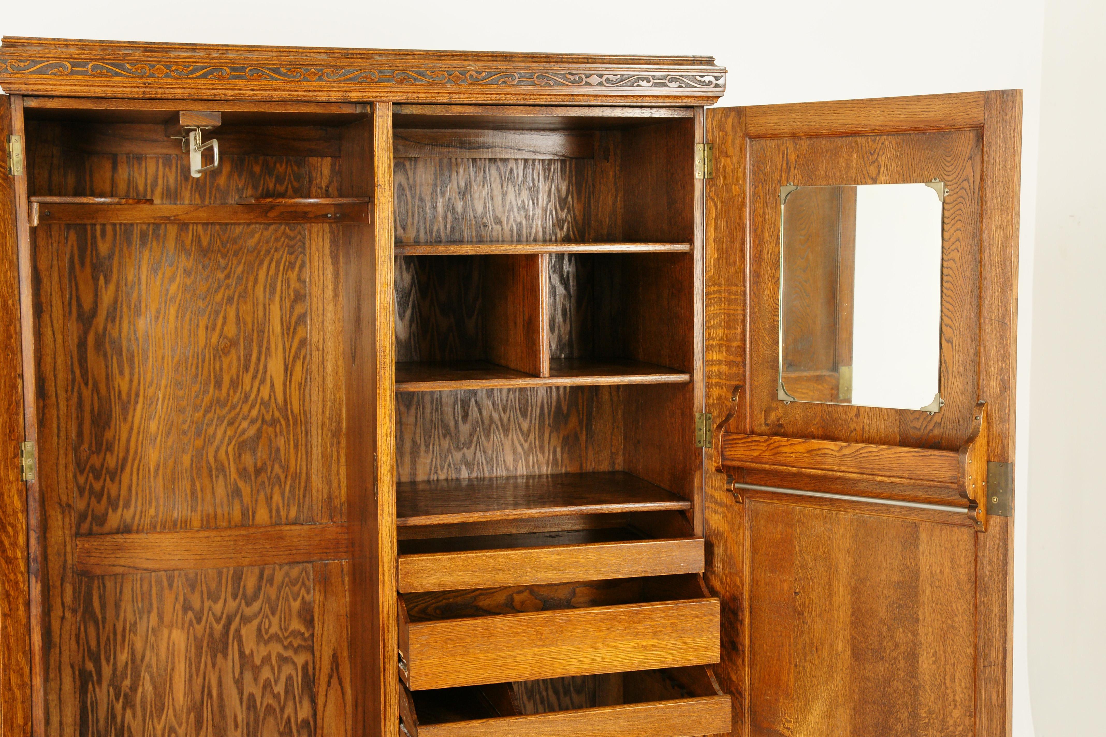 Antique wardrobe, antique armoire, tiger oak, oak Compactum, Scotland 1920, B1648

Scotland, 1920
solid tiger oak with original finish
carved cornice above
pair of carved paneled doors to the front
right door opens with cubby holes to the top
three