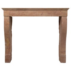 Antique Warm Colored Limestone Fireplace