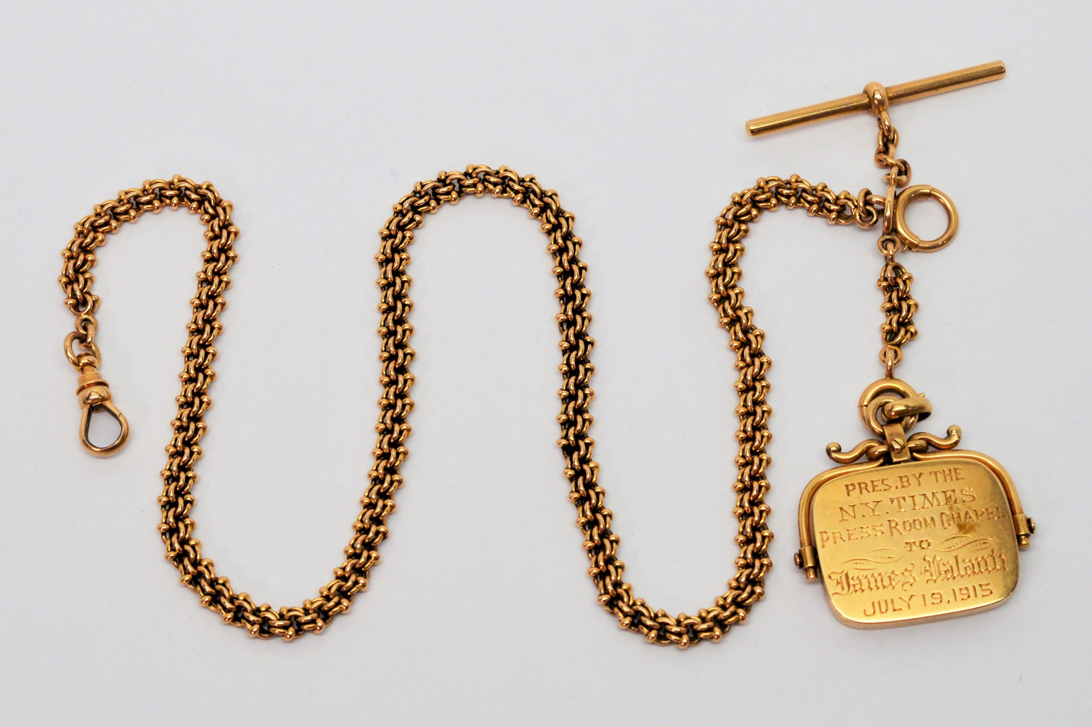Elegantly handmade fourteen carat (14K) yellow gold sixteen inch watch chain with T- bar and unique fob with 1 x 1/4 inch picture case personalize locket inscribed and dated 