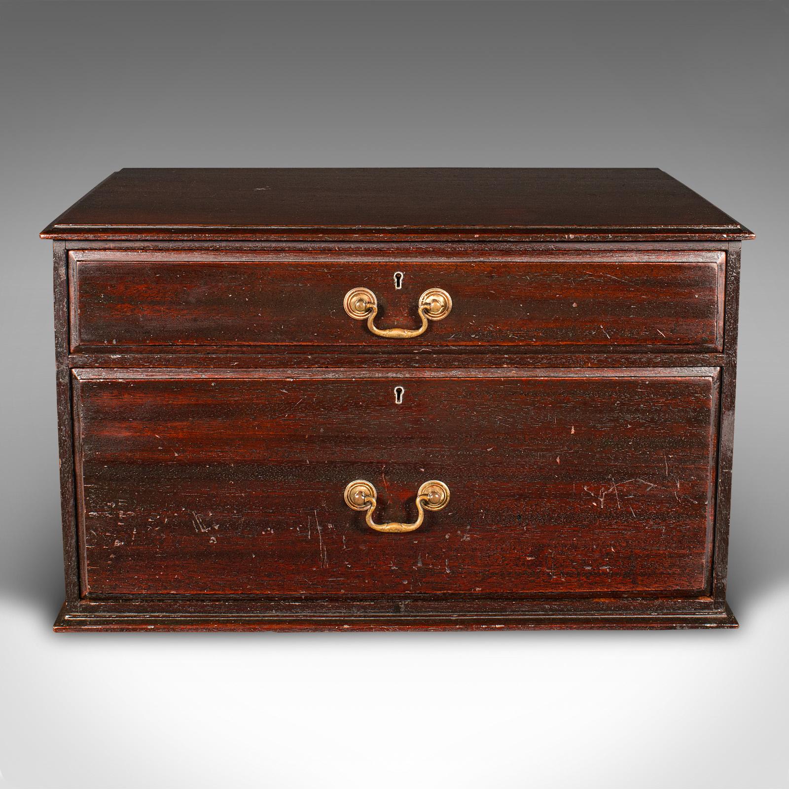 This is an antique watchmaker's cabinet. An English, mahogany two drawer work chest, dating to the mid Victorian period, circa 1860.

Appealingly original presentation with a pair of useful drawers
Displays a desirable aged patina with a lightly