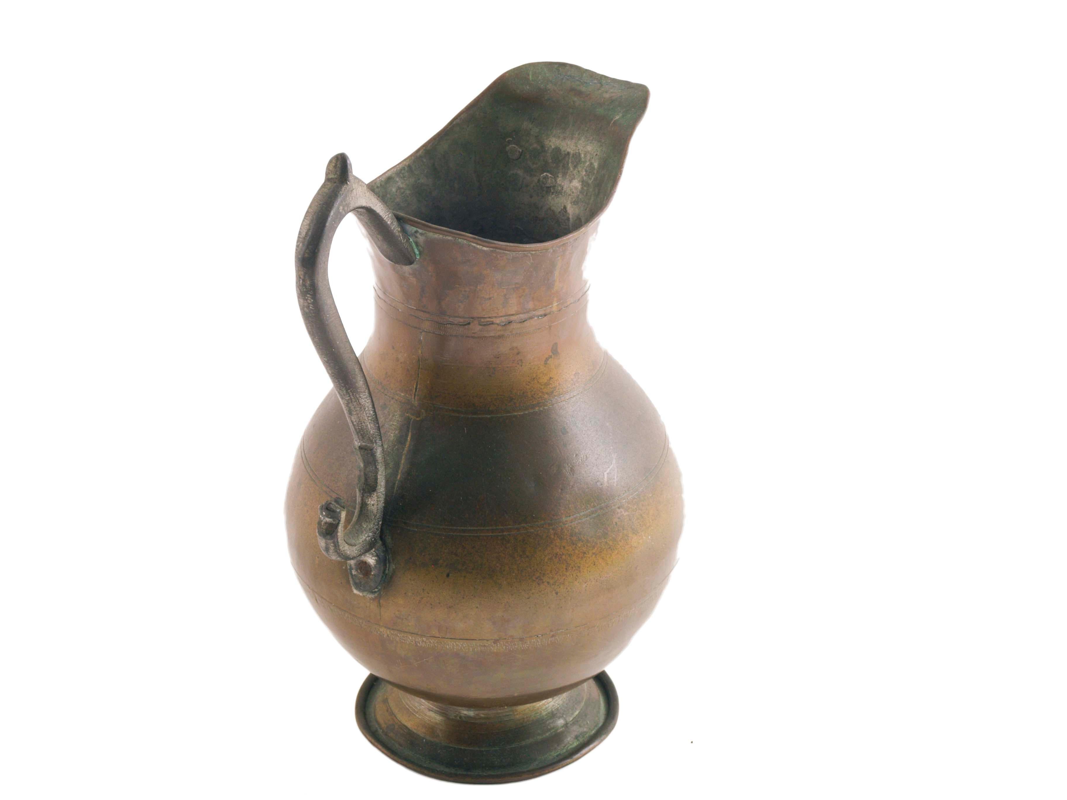 old water pitcher