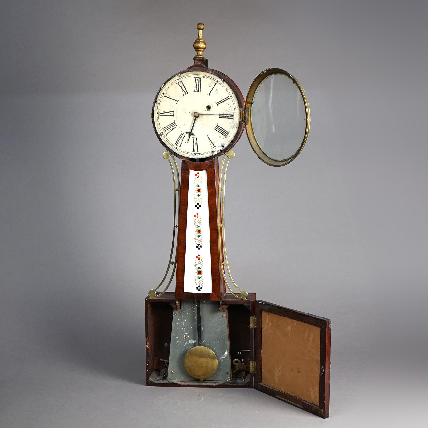 Antique Waterbury Mahogany Banjo Clock with Eglomise Painted Panel Circa 1830

Measures- 33.5''H x 10''W x 4''D