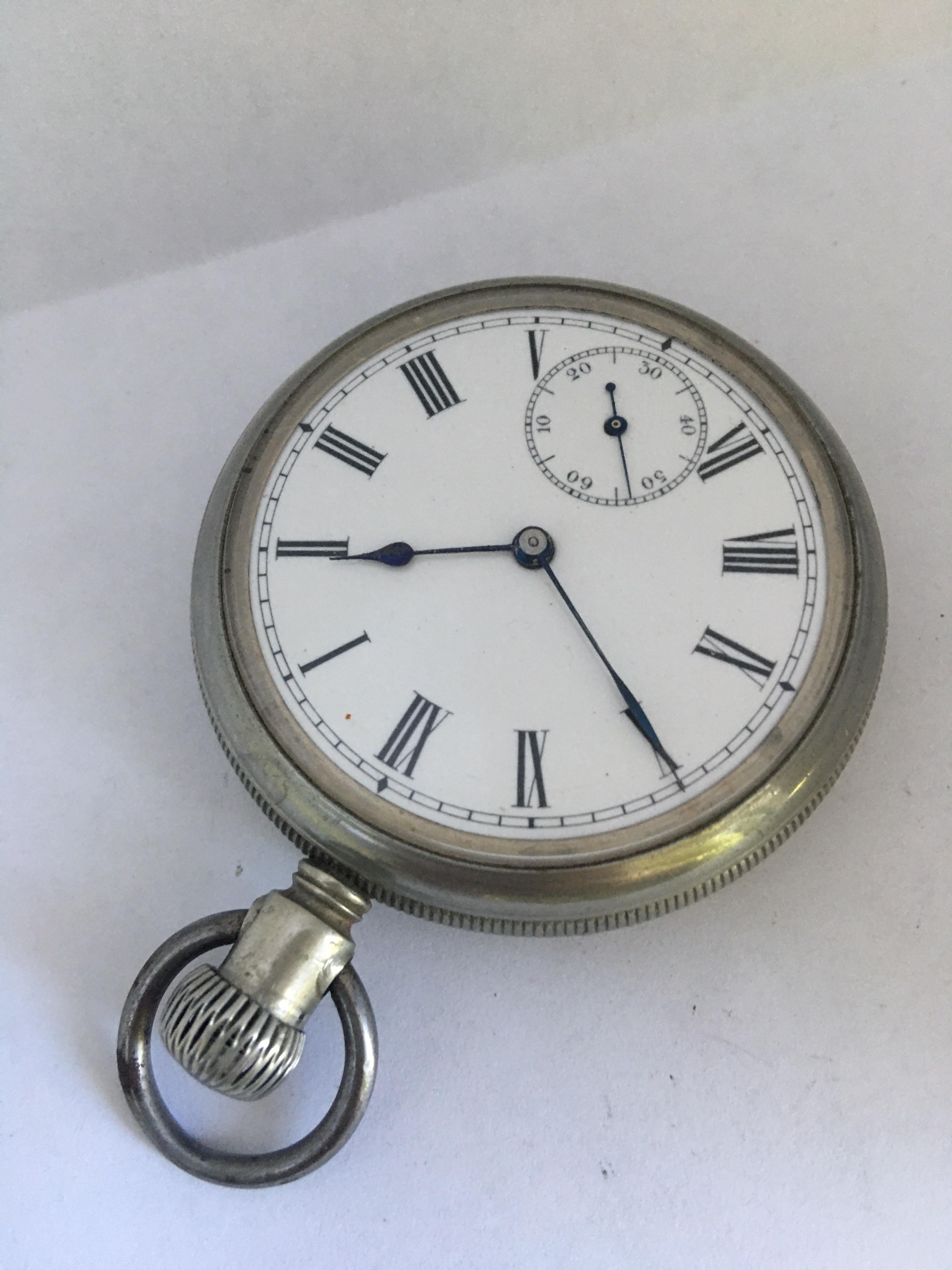 This pre-owned 51mm diameter antique hand winding pocket watch is in good working condition and it is ticking well. Visible signs of ageing and gentle used with light scratches on the watch case. Some tarnished on the loop or metal ring as
