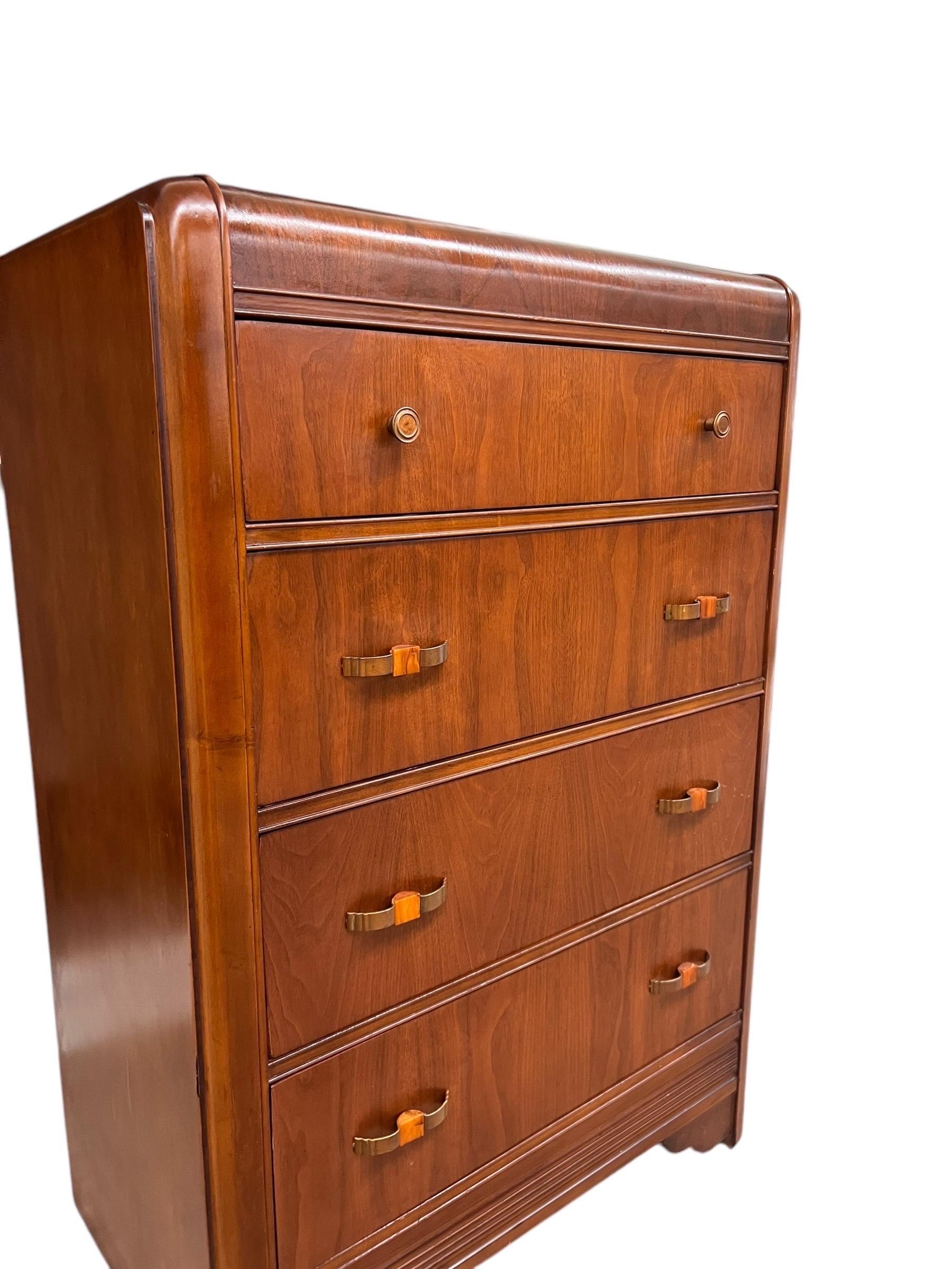 Mid-20th Century Antique Waterfall Dresser with Distinctive Art Deco Design and original hardware