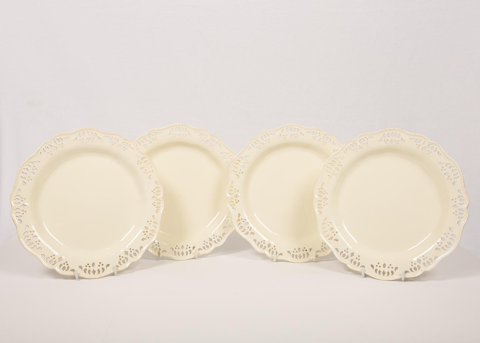 We are pleased to offer this group of four antique Wedgwood pierced creamware dishes made in 18th century England, circa 1785.
The dishes have twelve groups of piercings, and a slightly raised and scalloped edge. They are lightly potted. The overall