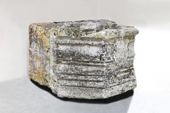 Testa di pozzo antica