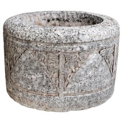 Tête de puits antique