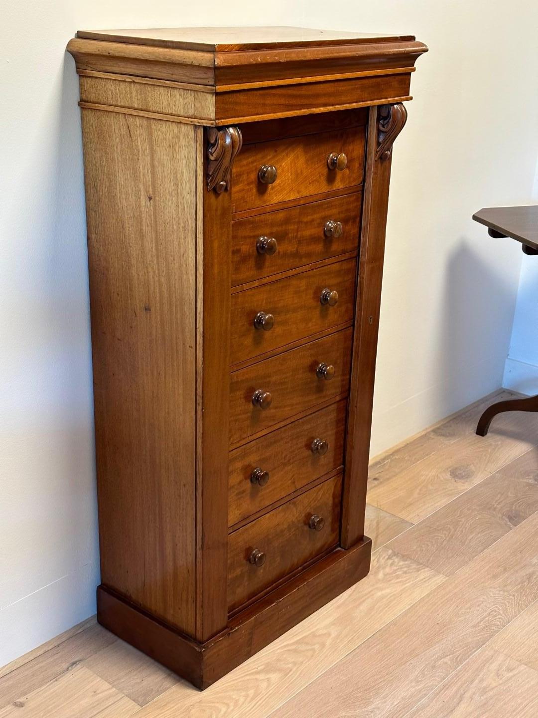 English Antique wellington chest of drawers