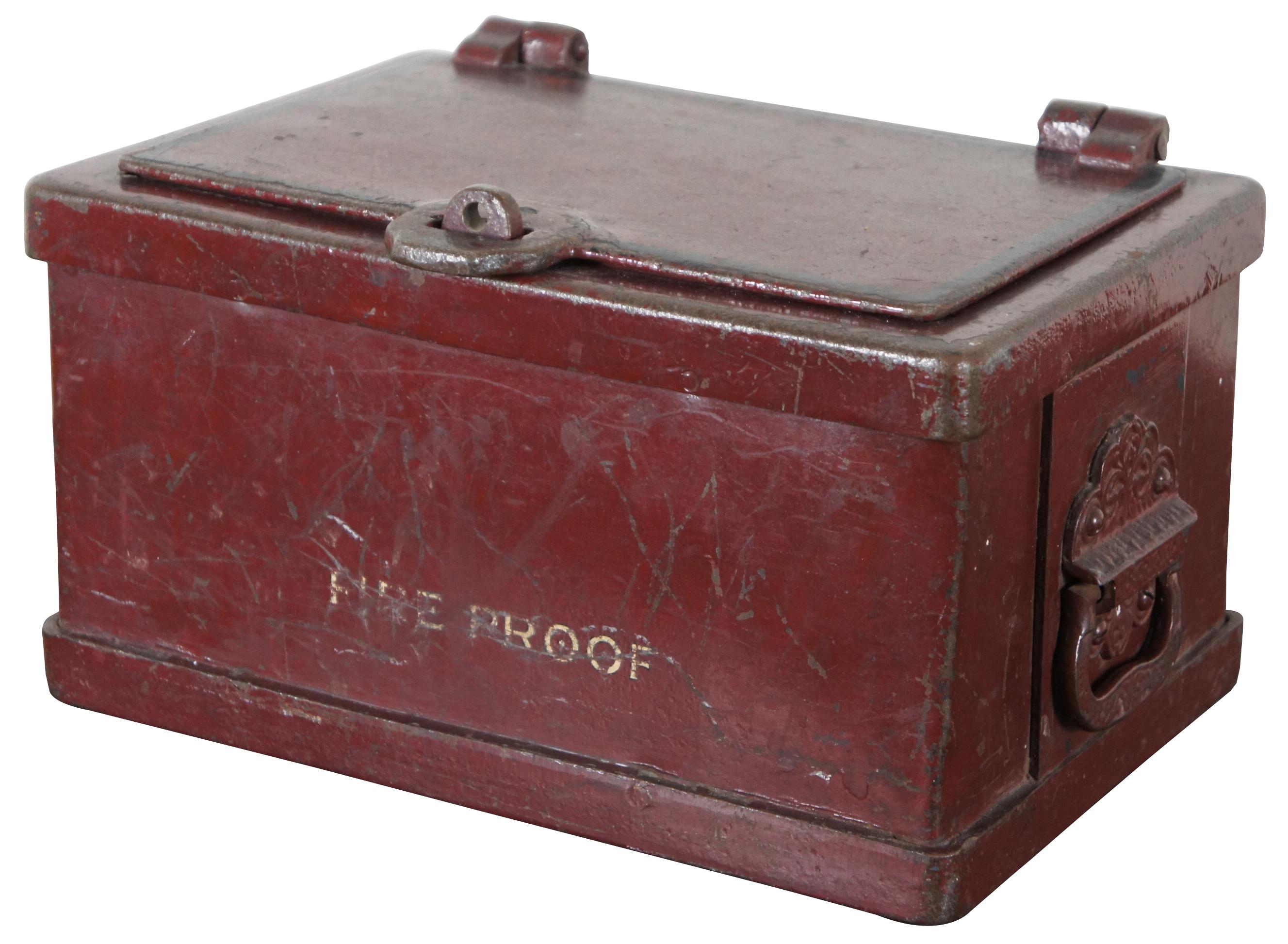 Rare antique 19th century Wells Fargo heavy iron stagecoach strong box, painted red and marked “Fire Proof” with loop on the lid for locking with a padlock.
 