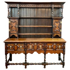 Antique Welsh Brass Mounted Carved Oak Dresser, Circa 1890-1900.