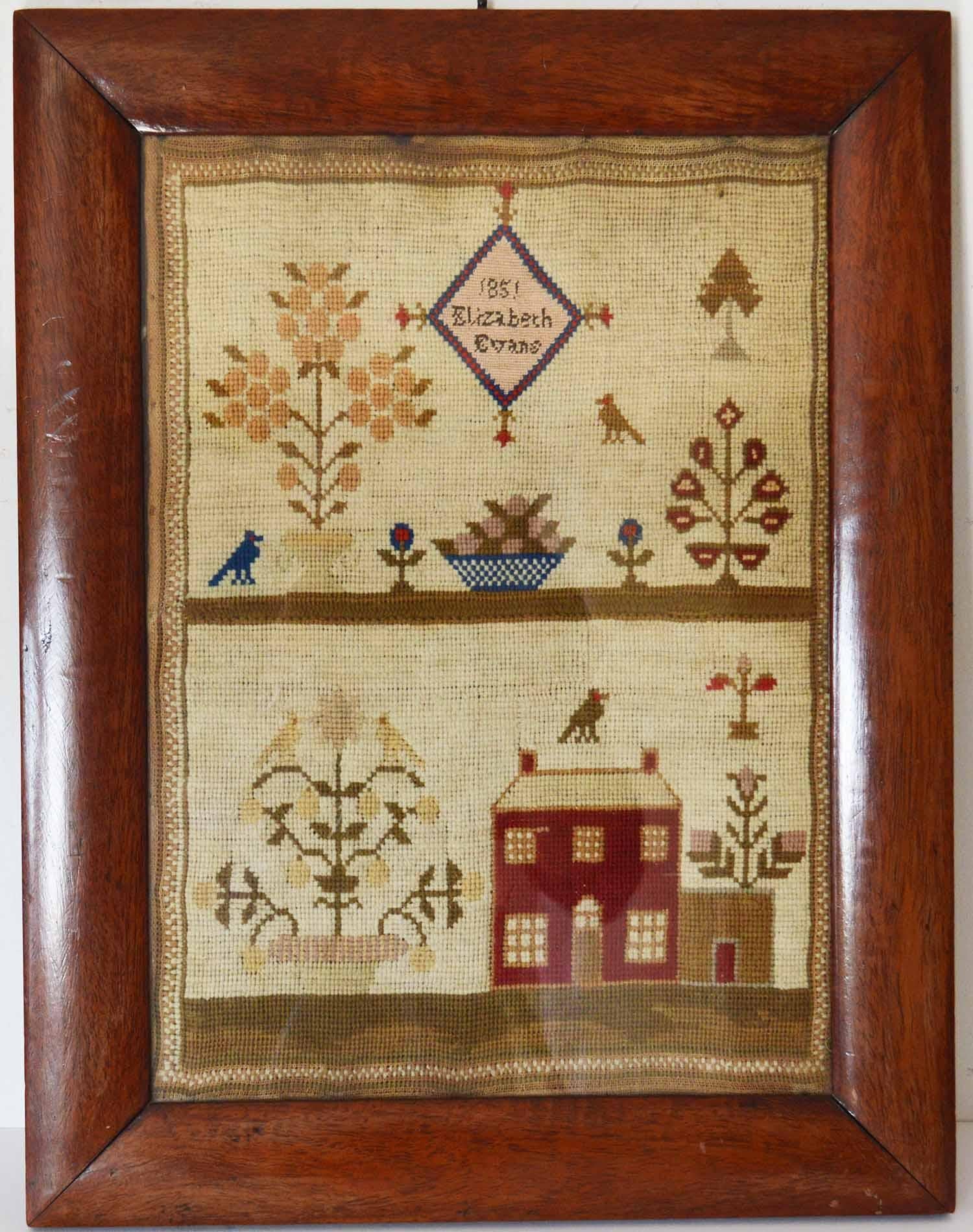 Lovely Welsh sampler with a country house.

By Elizabeth Evans, 1851

Most appealing with having the wool work of the country house as a subject.

Original rosewood frame

The measurement given below is the frame size.

