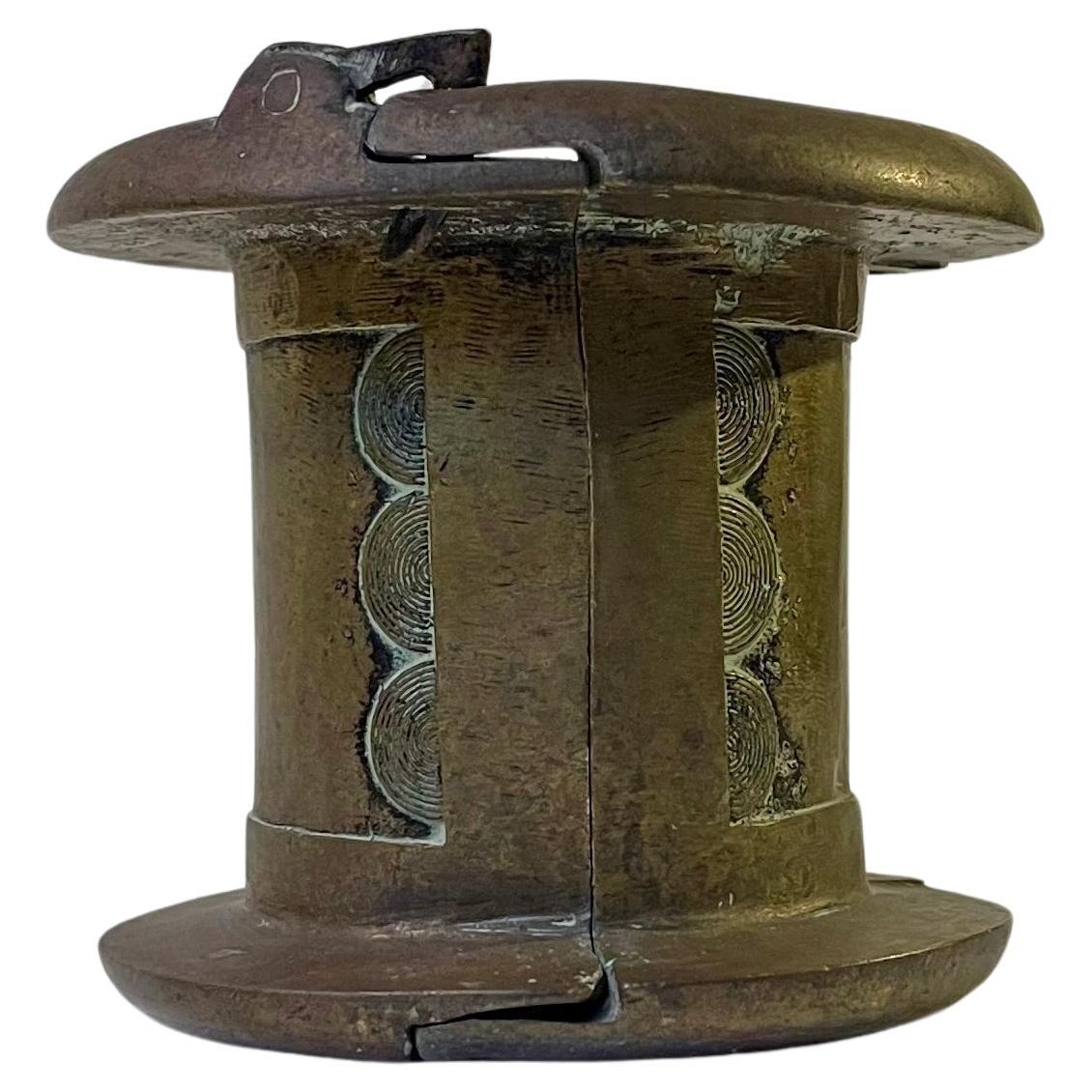 Bracelet ancien en bronze d'Afrique de l'Ouest en monnaie Baoulé - Senufo en vente
