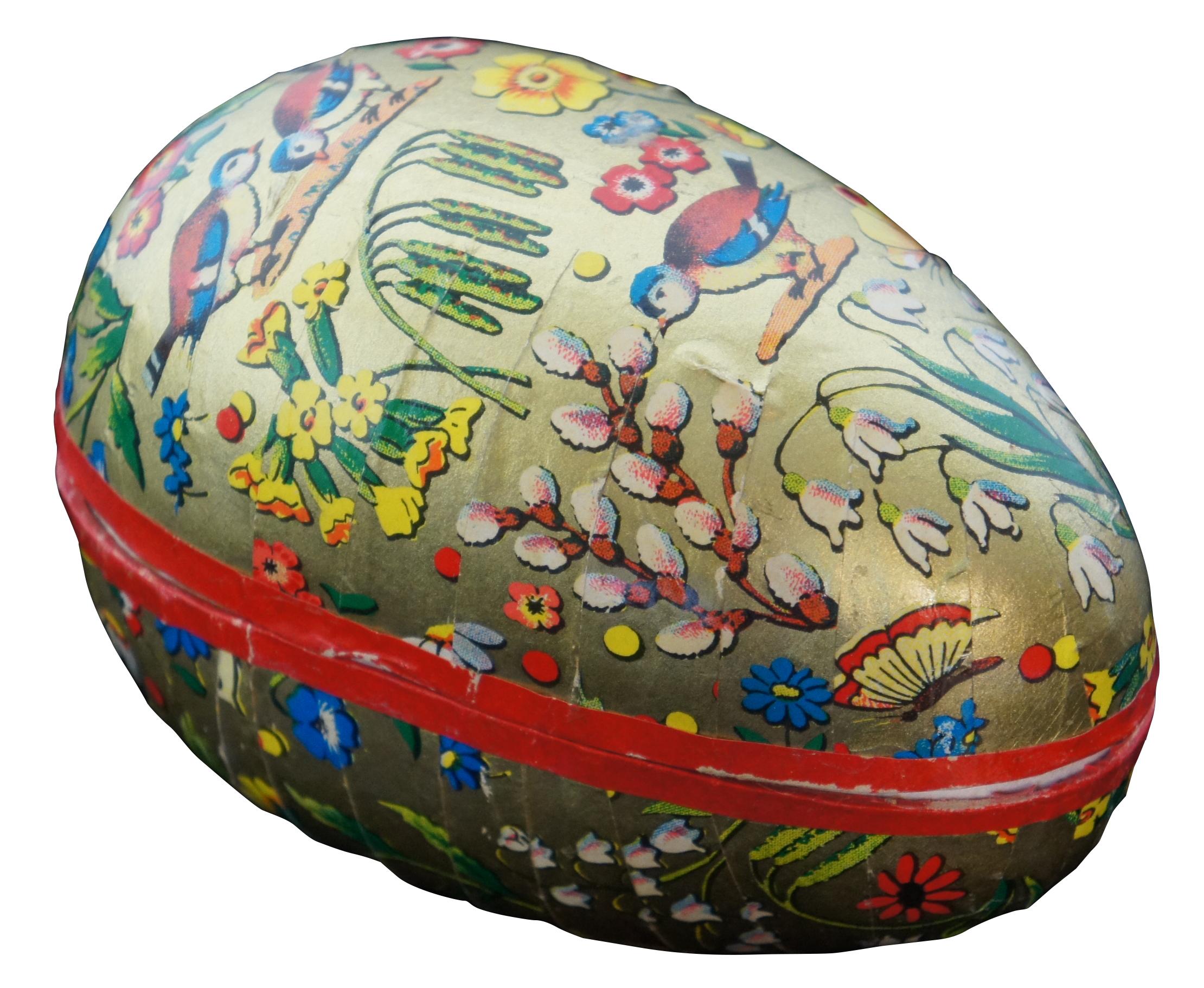 Antique West Germany papier mâché Easter egg candy container in metallic gold with images of butterflies, birds, lily of the valley, pussy willows, and other flowers. Measure: 5