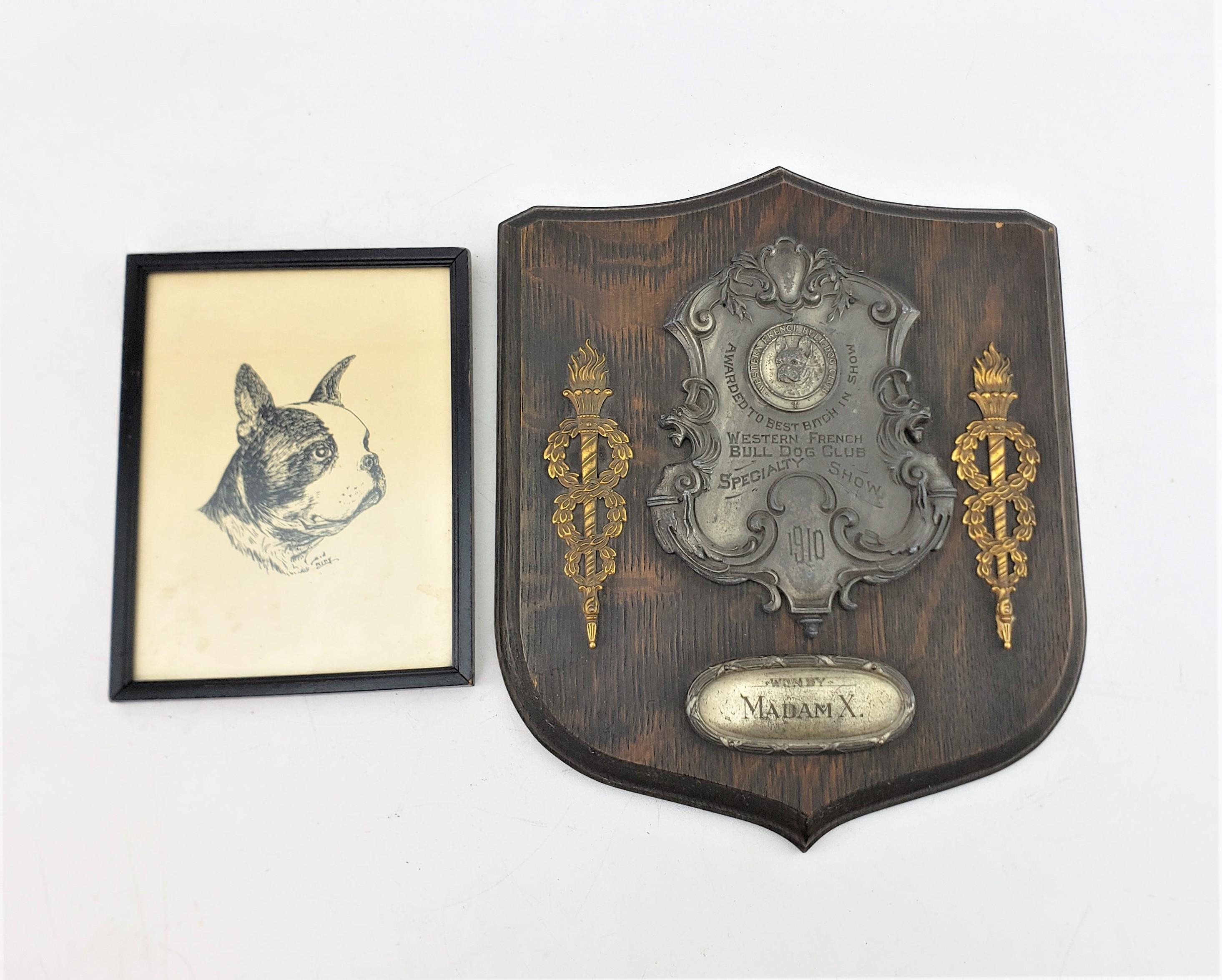 This grouping dates to approximately 1910 and is composed of an award plaque presented to 