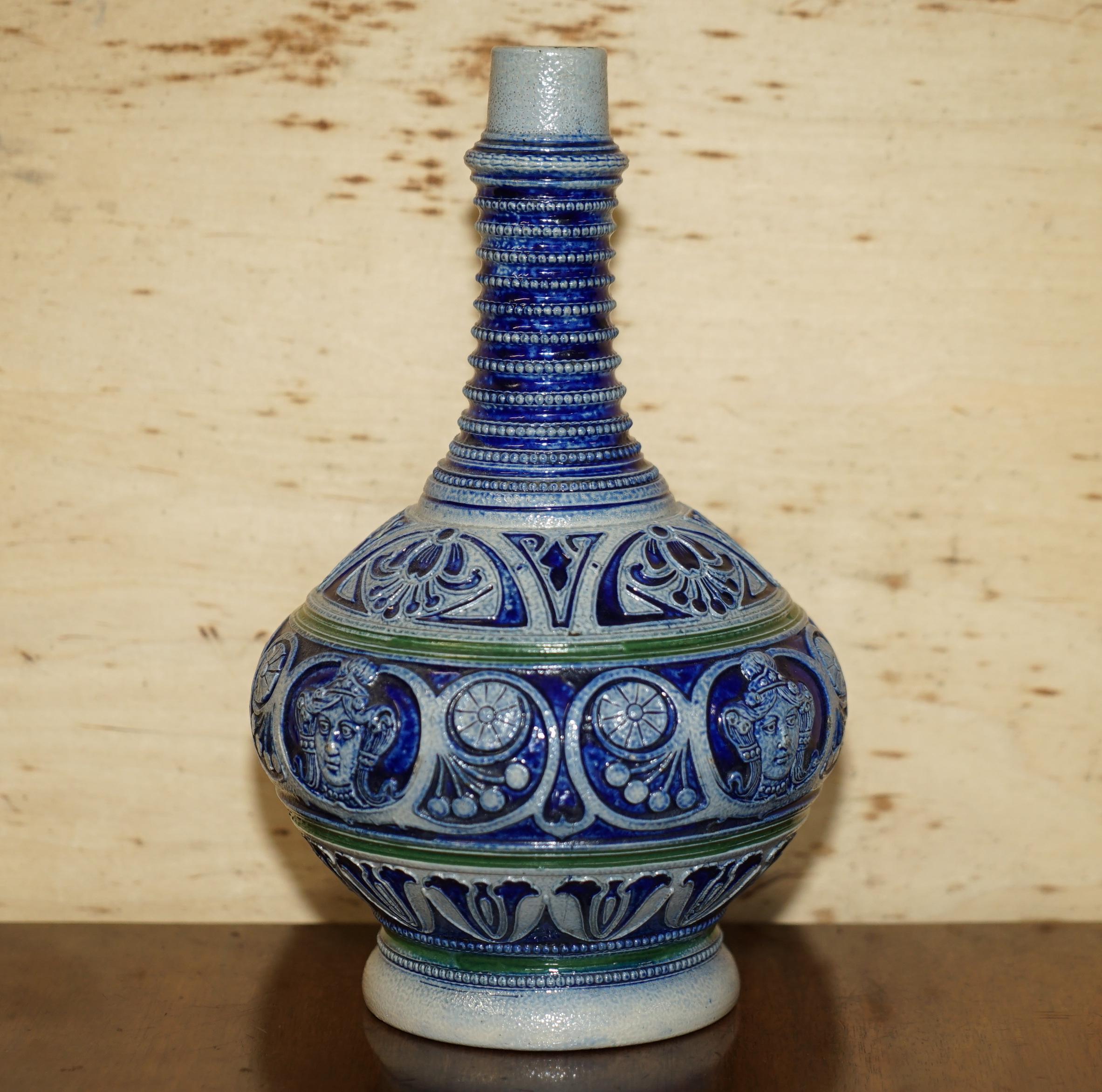 We are delighted to offer for sale this lovely Antique Westerwald pottery vase with Neoclassical figure heads

A very decorative stoneware vase in lovely antique order

The condition is good for the age as you can see in the pictures, there will