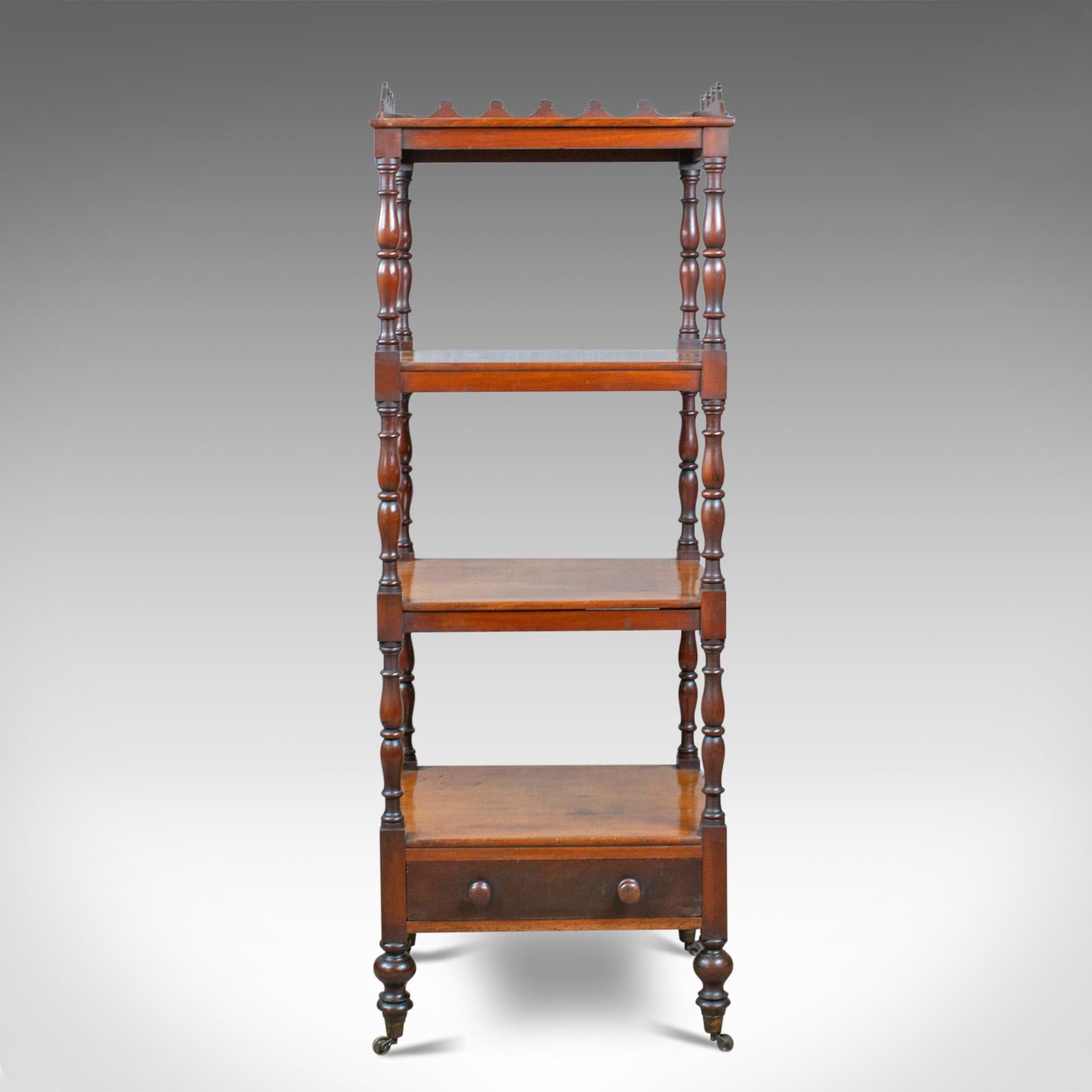 This is an antique whatnot, an English, mahogany, four-tier, Regency display stand dating to the early 19th century, circa 1820.

Delightful, rich, russet tones to the select mahogany
Good consistent colour in the wax polished finish
Grain