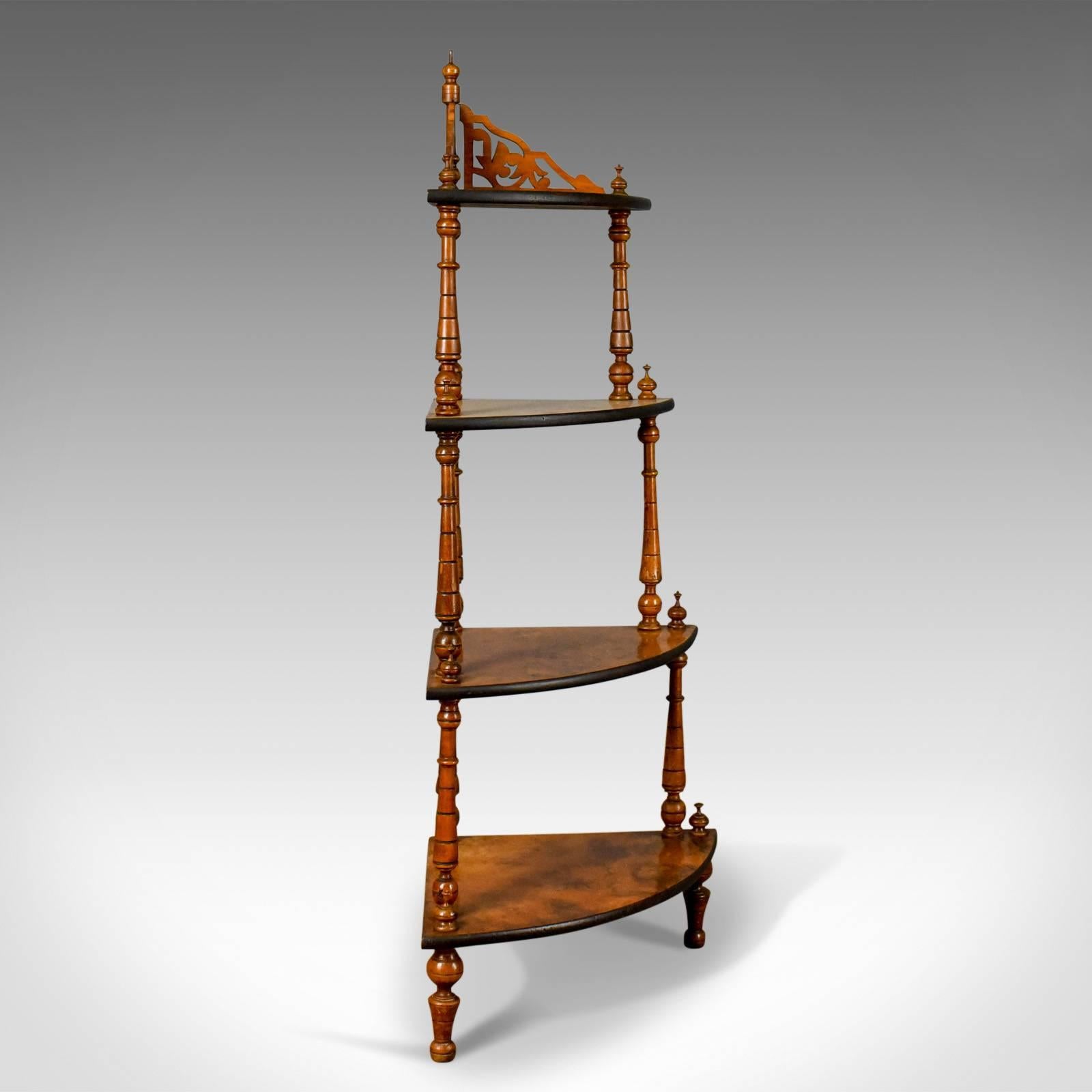 This is an antique whatnot, an English, Victorian, burr walnut, four-tier, corner display stand dating the late 19th century, circa 1880.

Attractive, well figured, burr walnut, graduated shelves
Subtly rounded edge profiles with an ebonised