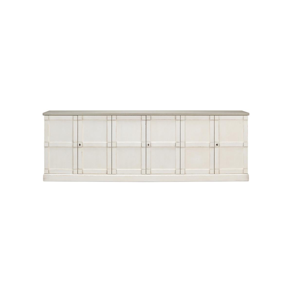 Made of pine finished in an off-white paint that is lightly distressed, with six doors, a rectangular form and a perfect depth of 15
