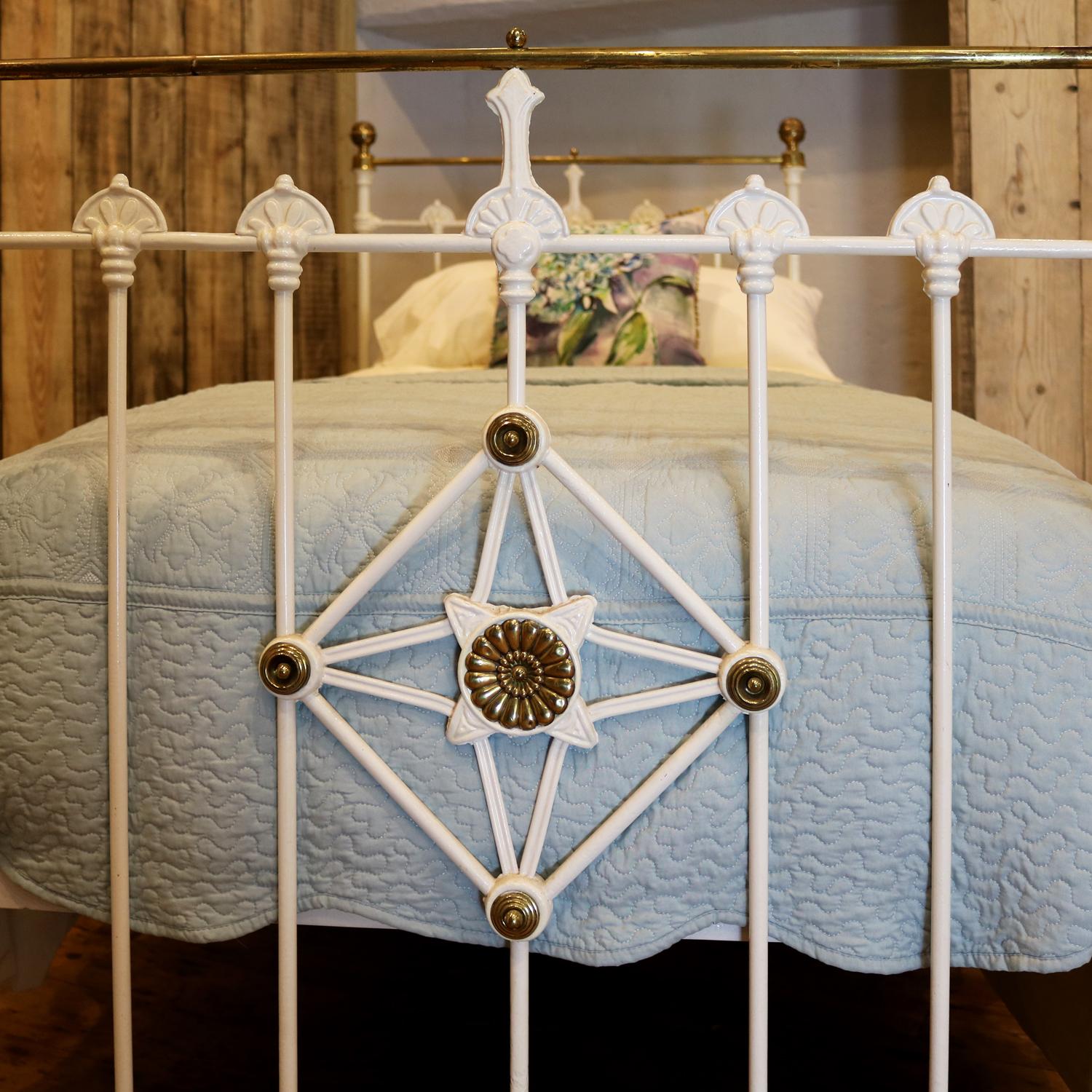 white brass bed