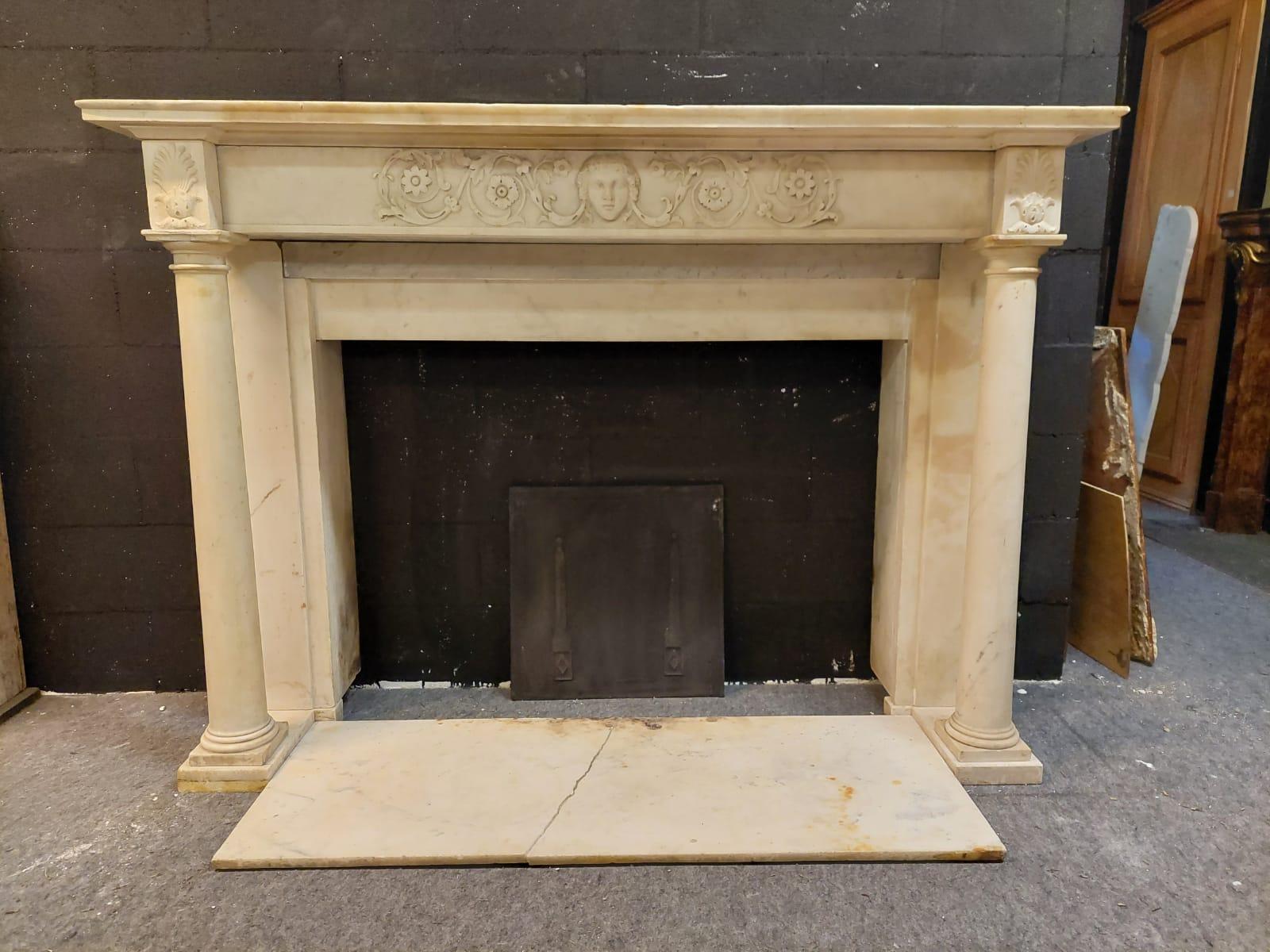Antique mantel fireplace, hand-carved in white Carrara marble, with columns and pediment with Venus, complete with original threshold to be repaired, from Milan, built in the first quarter of the 19th century by an Italian craftsman. Elegant in