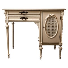 Antique white desk in the style of classicism