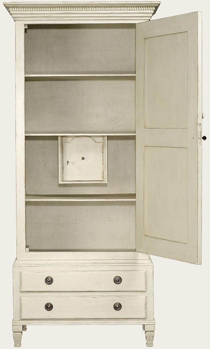 Wonderful antique white, distressed painted wardrobe / cabinet with shelves, two drawers below, and a safe inside is perfect for any bedroom, hallway, living room or even kitchen. Hand carved and painted with a warm off-white color with solid wood