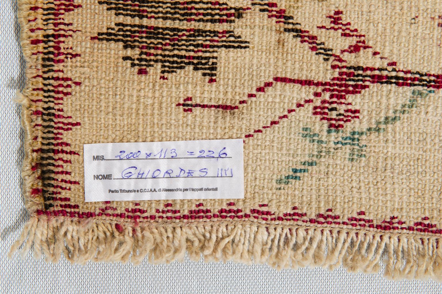 (1121) - Rare antique white Ghiordes prayer from my private collection - one of the most famous Anatolian rugs.
On the white background some raspberry red flowers.
It is from the end of XIX century; its ends have been rebuilt, around 1950.

   
