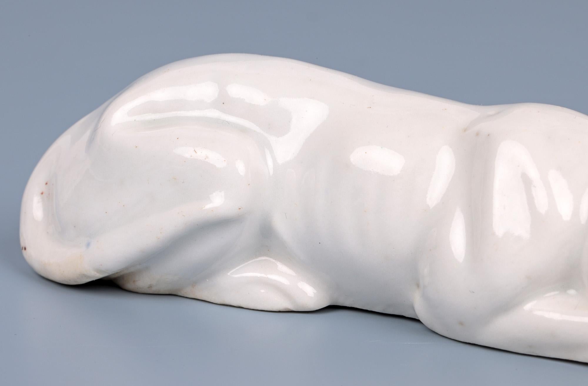 Georgian Antique White Glazed Porcelain Recumbent Hound Figure For Sale