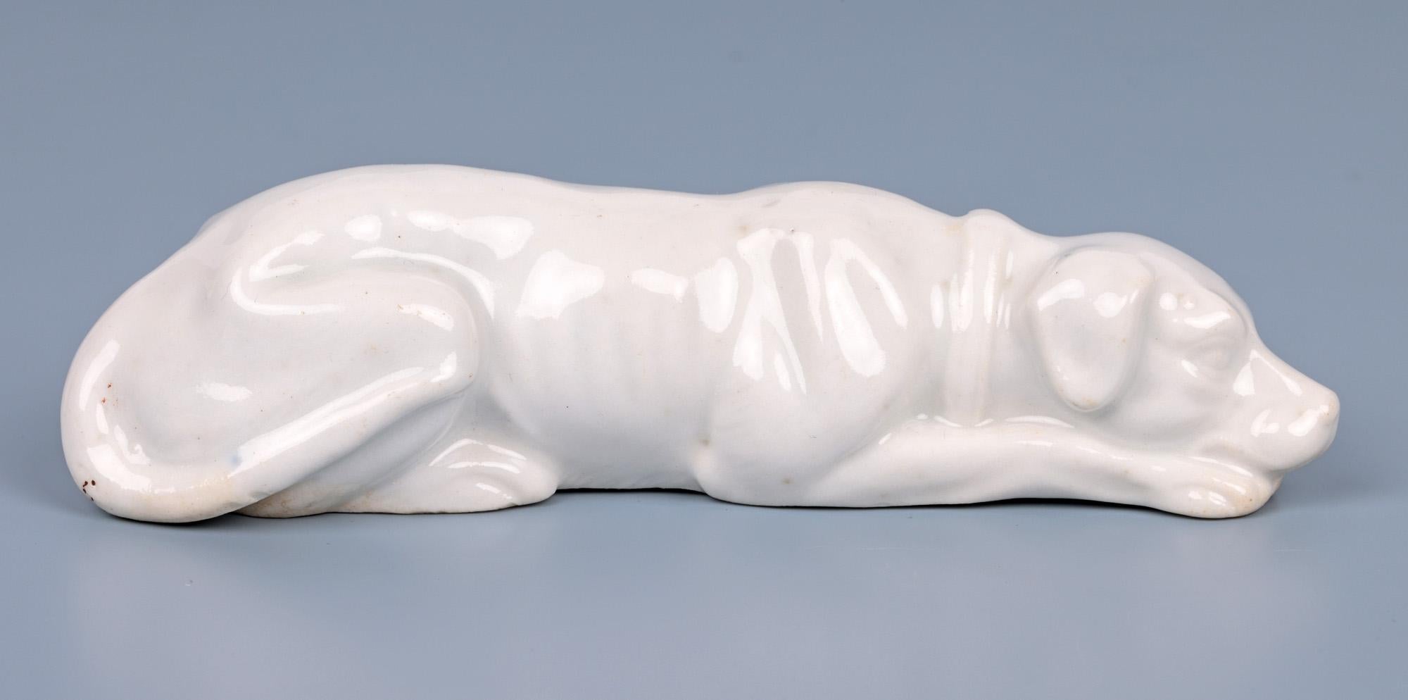 Antique White Glazed Porcelain Recumbent Hound Figure In Good Condition For Sale In Bishop's Stortford, Hertfordshire