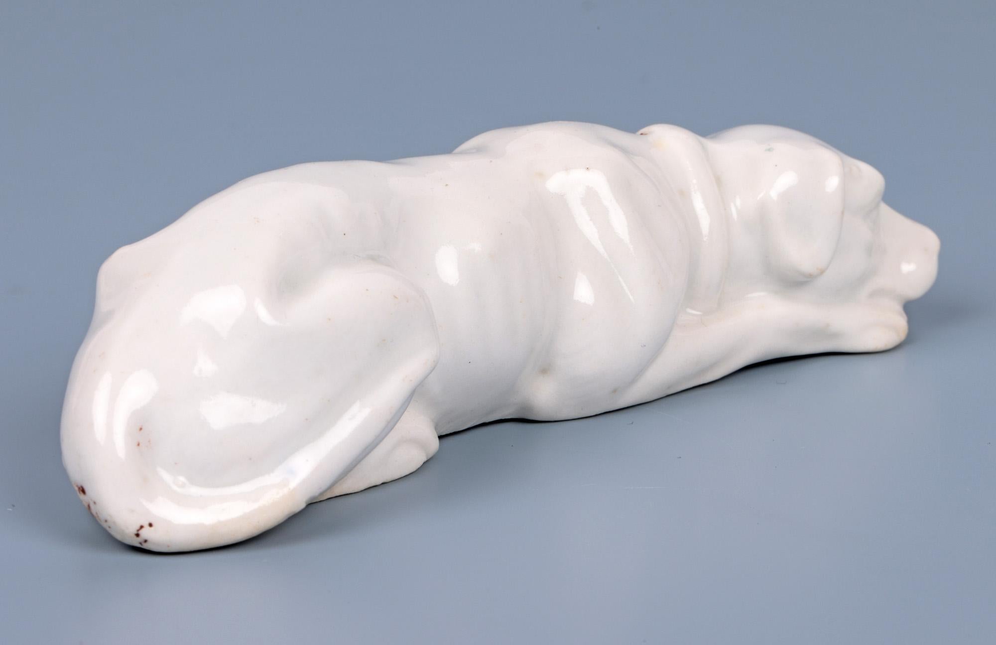 Antique White Glazed Porcelain Recumbent Hound Figure For Sale 1