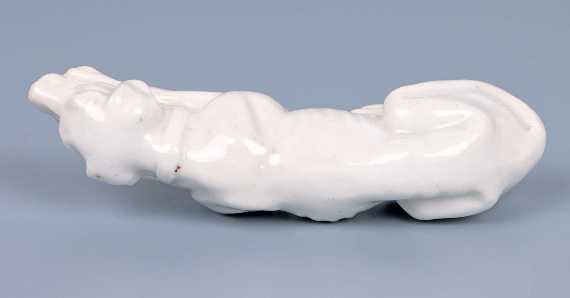 Antique White Glazed Porcelain Recumbent Hound Figure For Sale 2