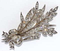 Antique White Gold Diamond Brooch as a Bouquet of Flowers with a Bow