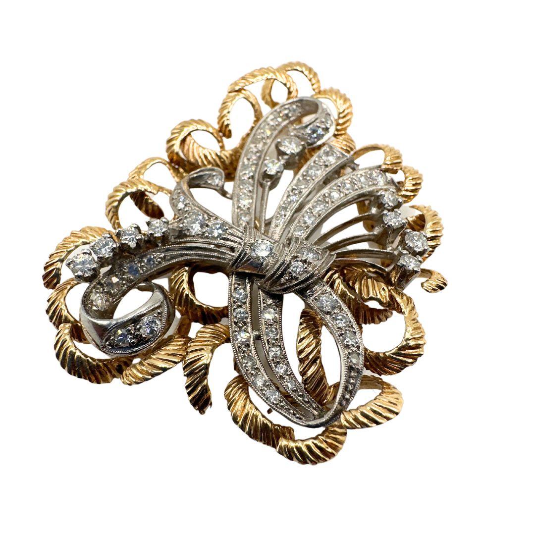 Indulge in Vintage Elegance: Step into a world of timeless allure with our exquisite white and gold brooch, a perfect blend of sophistication and luxury. Crafted with meticulous attention to detail, this stunning piece evokes the charm of the past