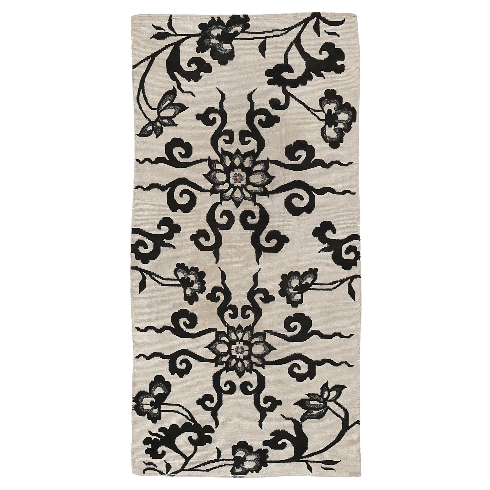 Antique White Ground Tibetan Khaden Rug with Black Lotus Flowers and Tendrils
