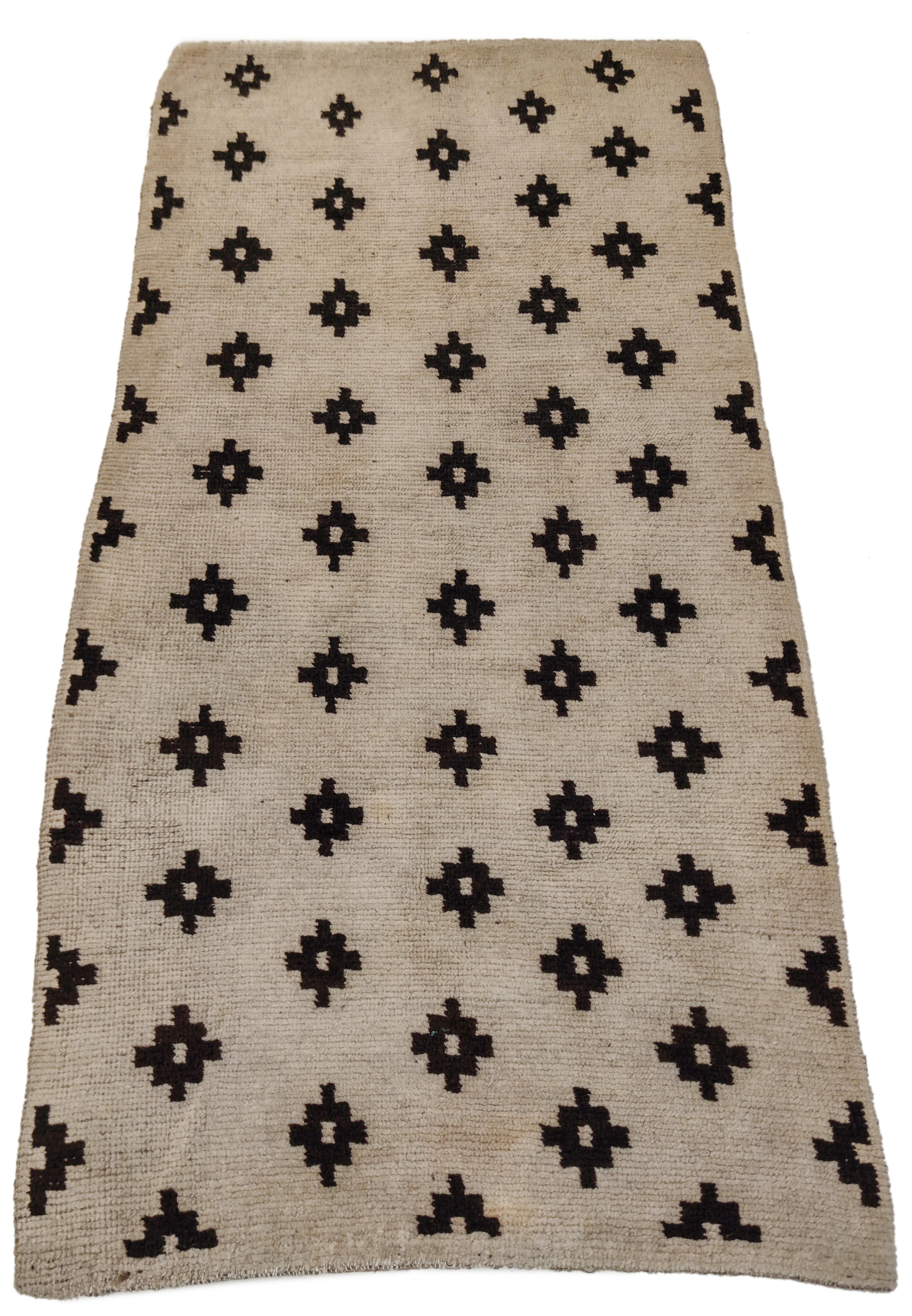 Hand-Knotted Antique White Ground Tibetan Khaden Rug with Black Stepped Diamonds For Sale