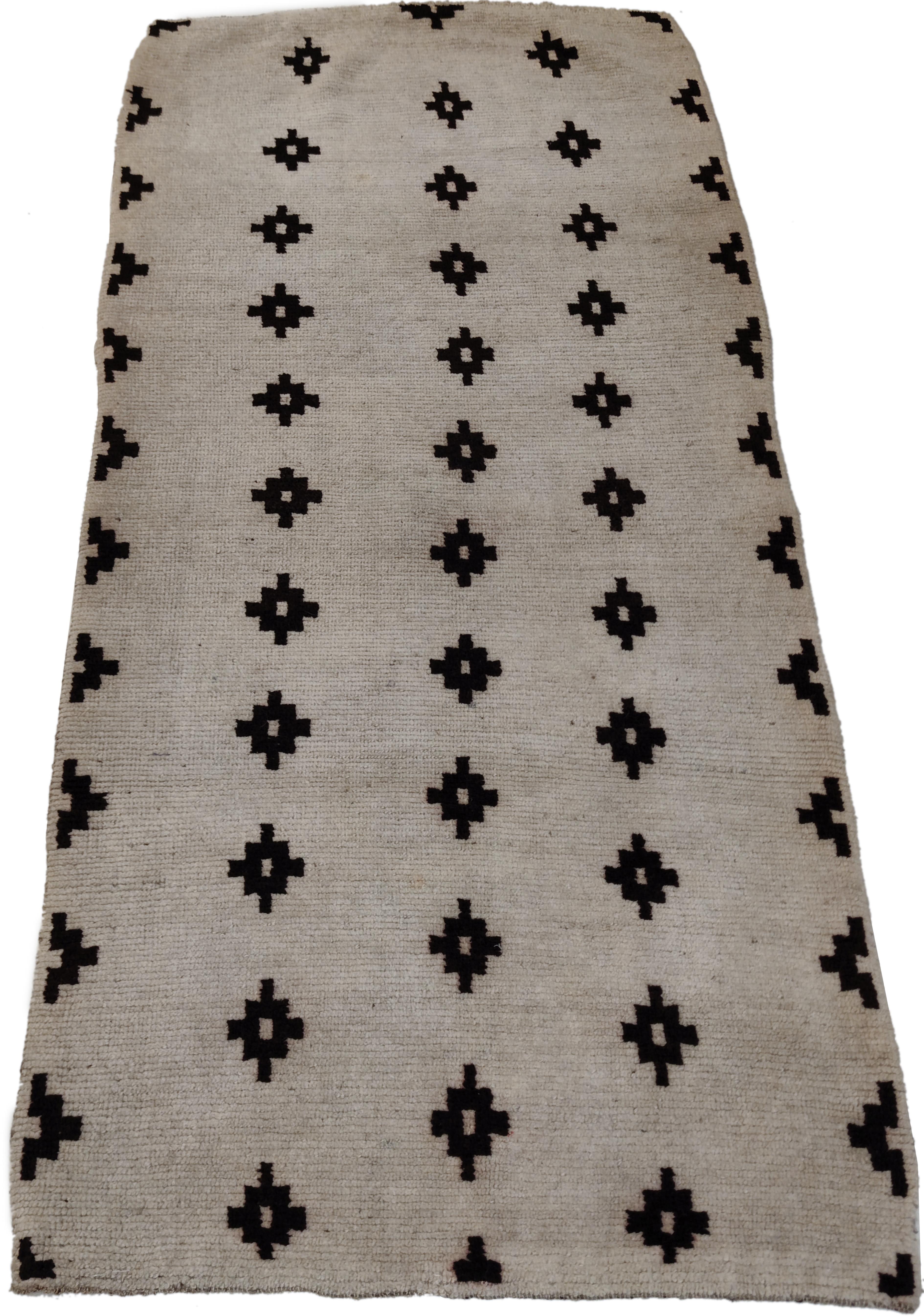 Hand-Knotted Antique White Ground Tibetan Khaden Rug with Black Stepped Diamonds For Sale