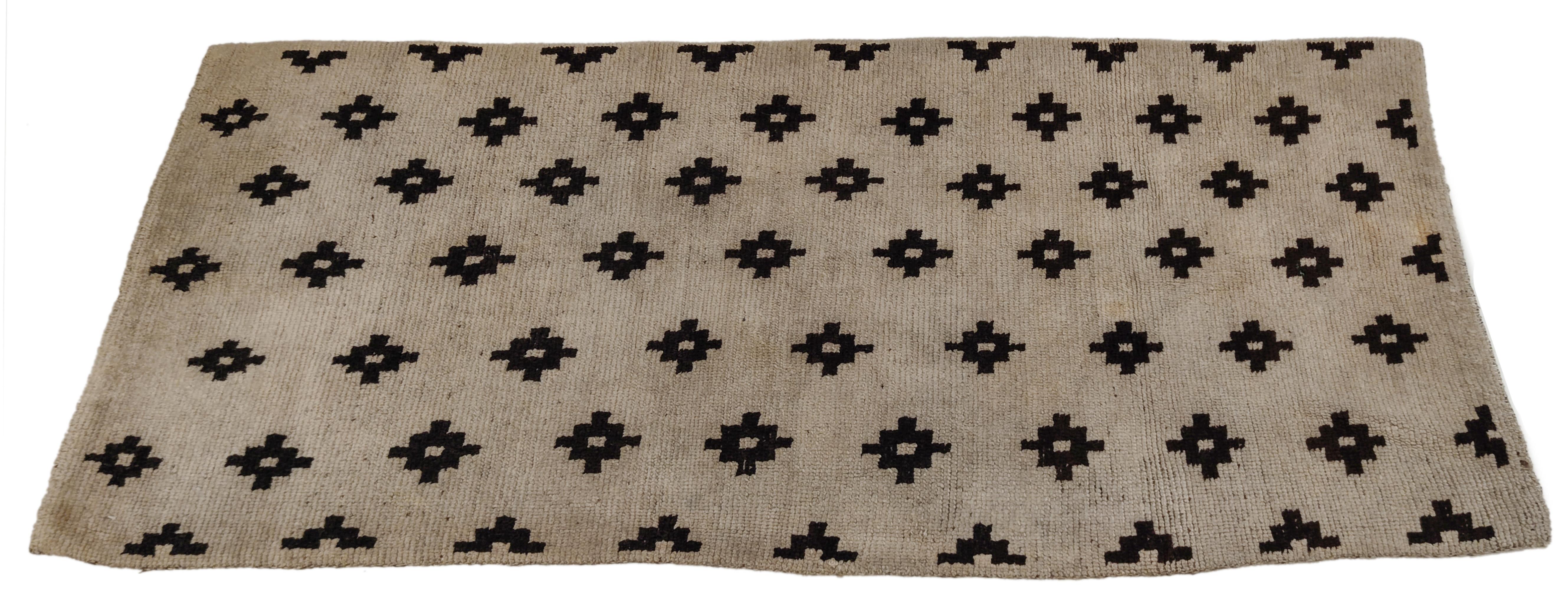 Late 19th Century Antique White Ground Tibetan Khaden Rug with Black Stepped Diamonds For Sale