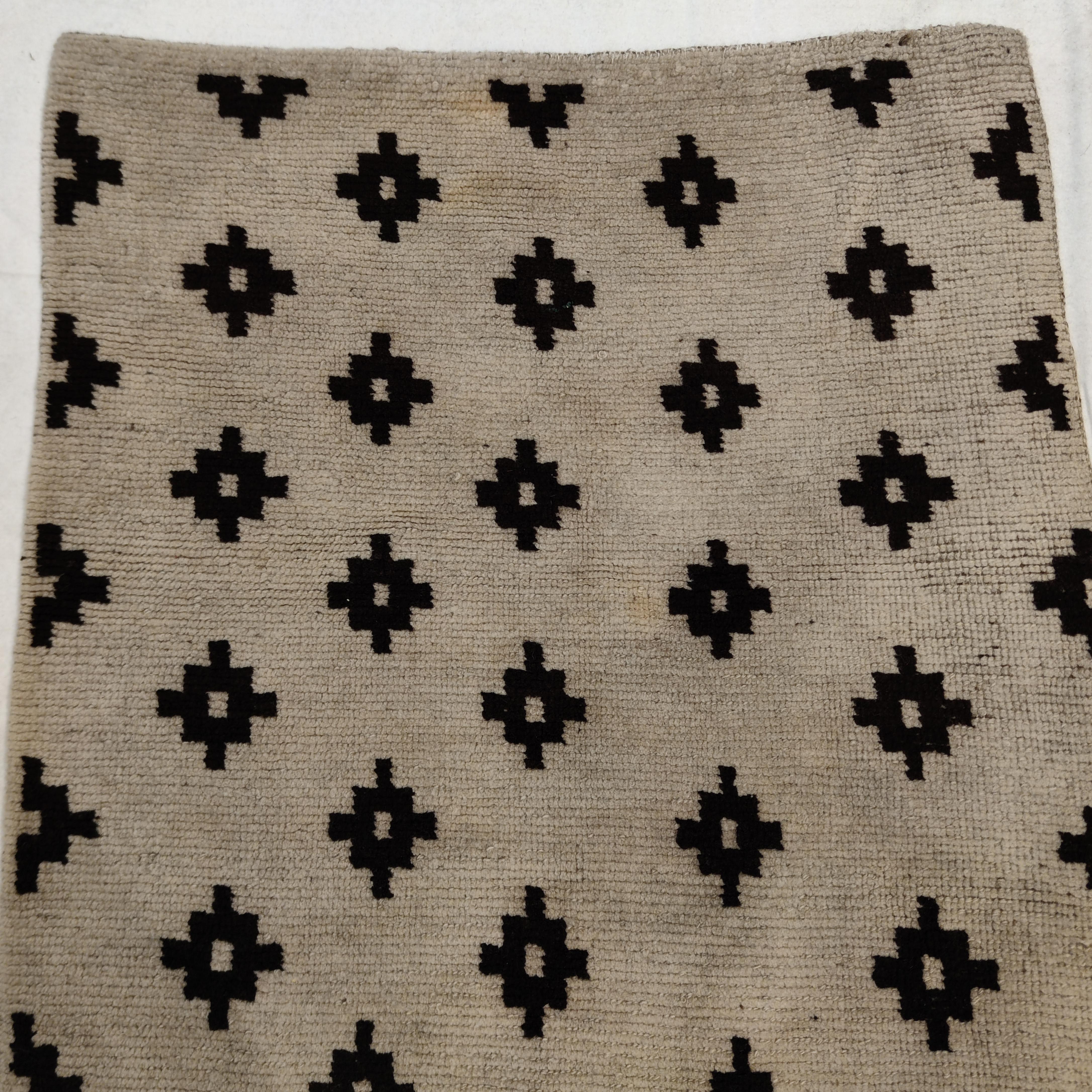 Wool Antique White Ground Tibetan Khaden Rug with Black Stepped Diamonds For Sale