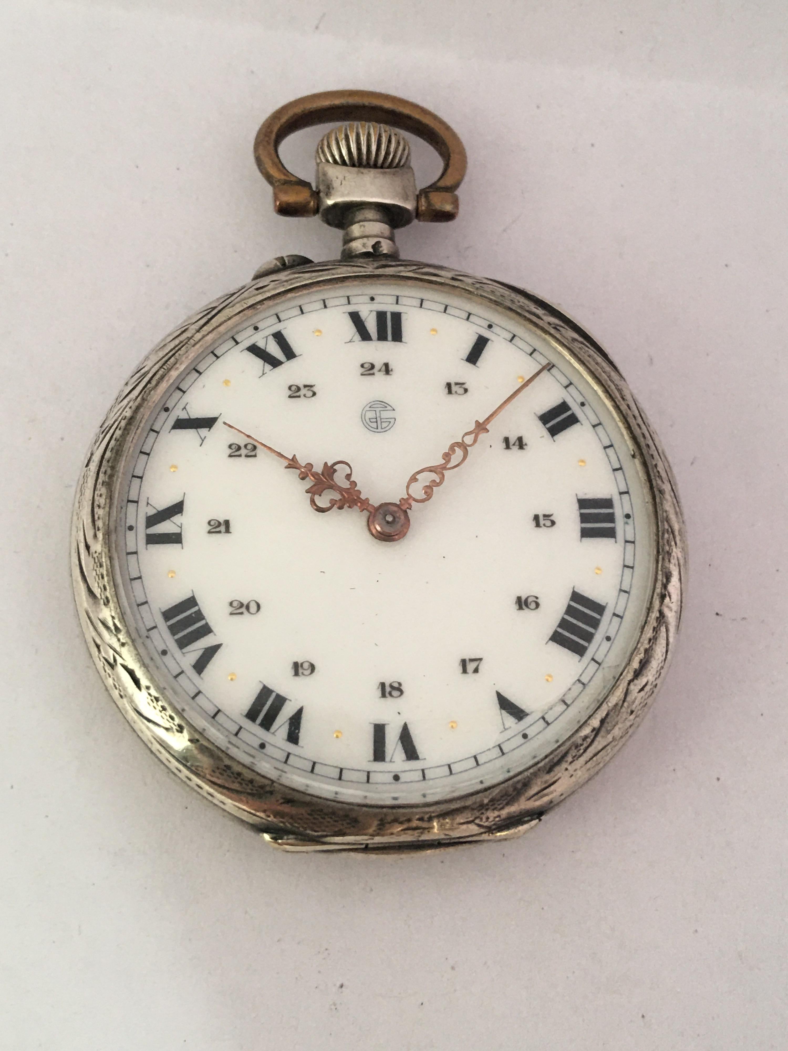 Continental white metal cylinder pocket watch, unsigned gilt frosted movement, the cuvette inscribed L Collaine á Gannat, the dial with Roman numerals, inner Arabic twenty-four hour chapter and fancy gilt hands, engine turned and a foliate engraved