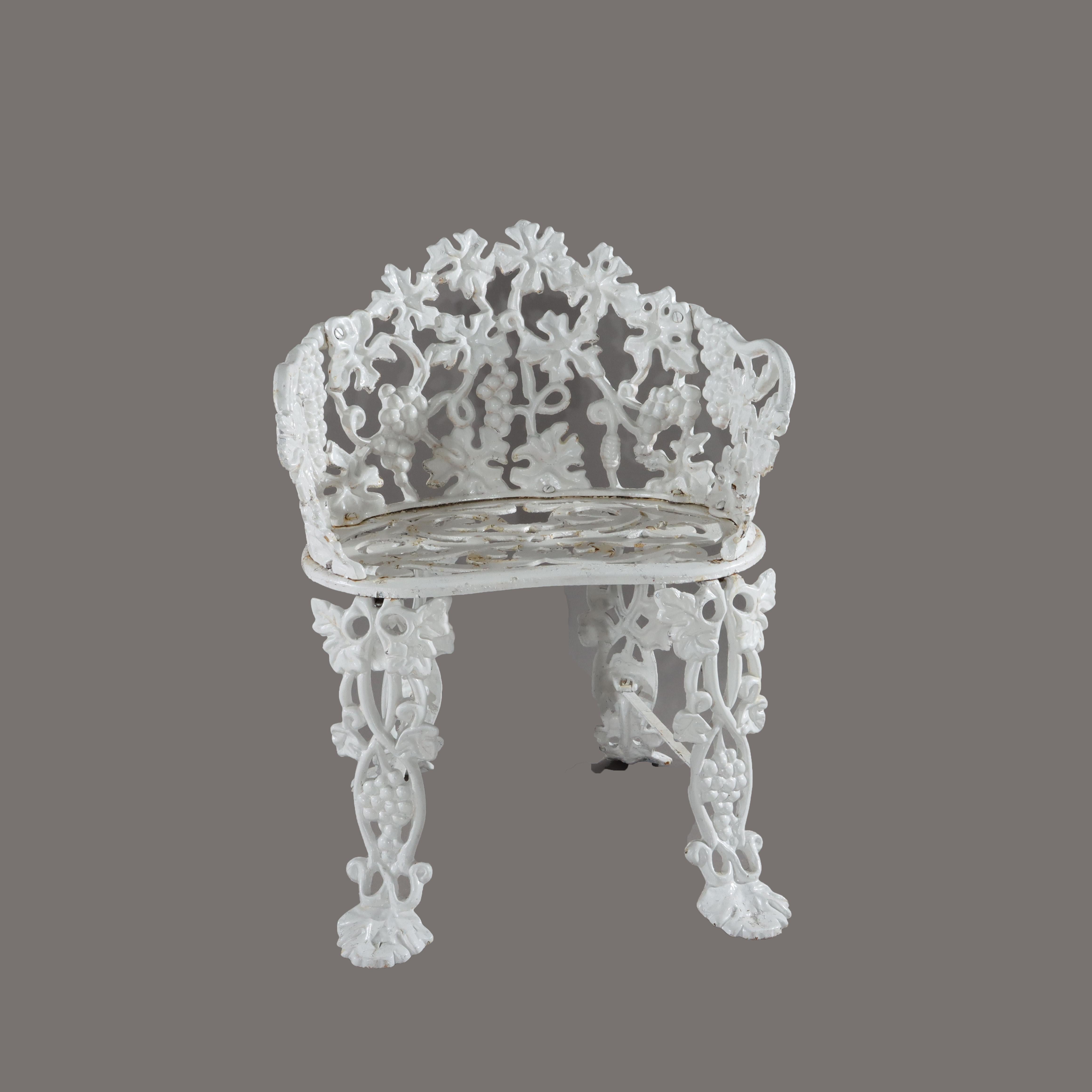 ***Reduced In-House Delivery Rates - Click on “Ask Seller” to Request a Quote***
Antique White Painted Wrought Iron Grape & Leaf Garden Seat c1890.    
Measures - 25 3/8